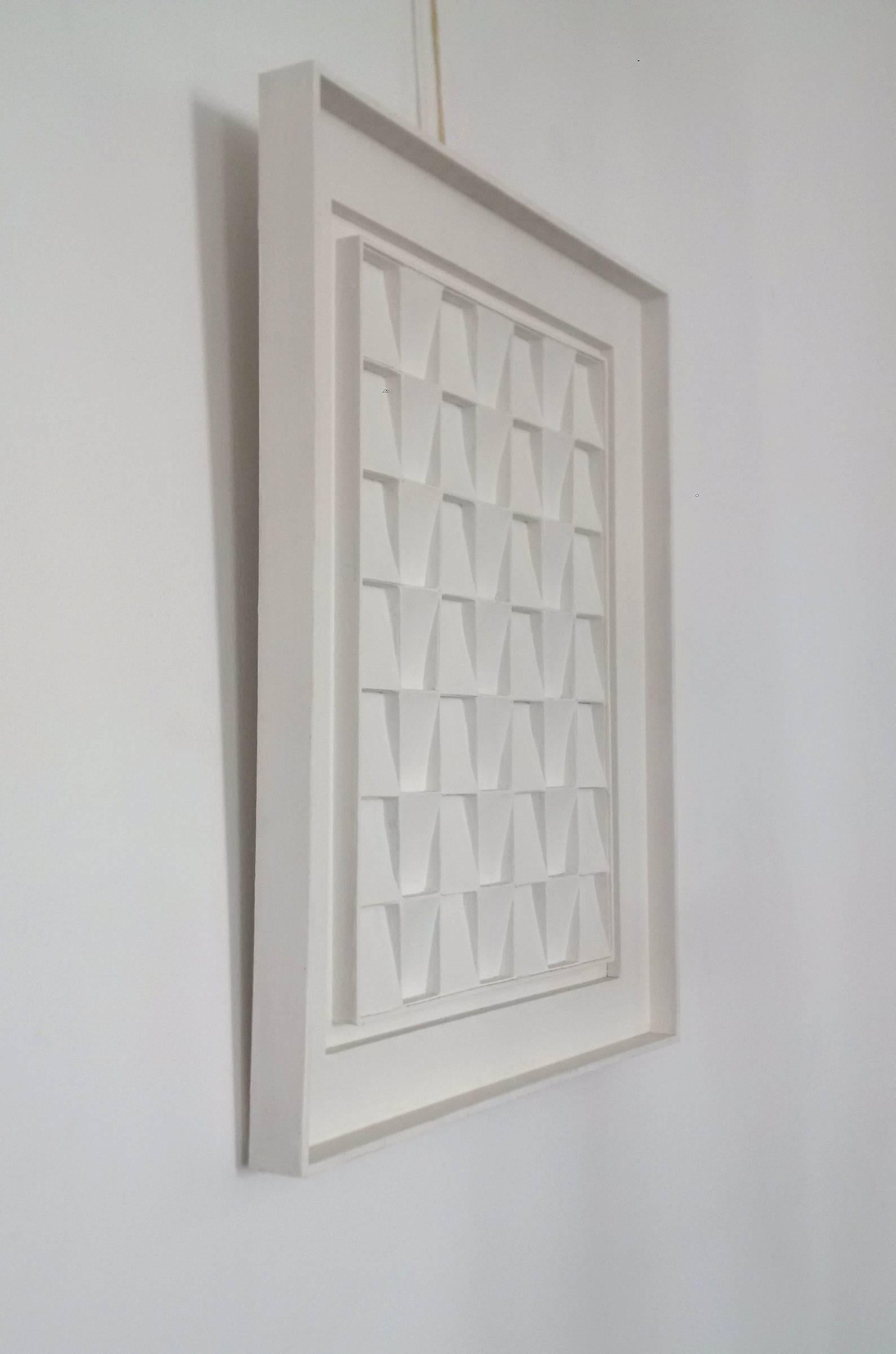 White painted cardboard on wooden panel,

circa 1960.

Measures: 49 x 37 cm with frame 64 x 53 cm.
      