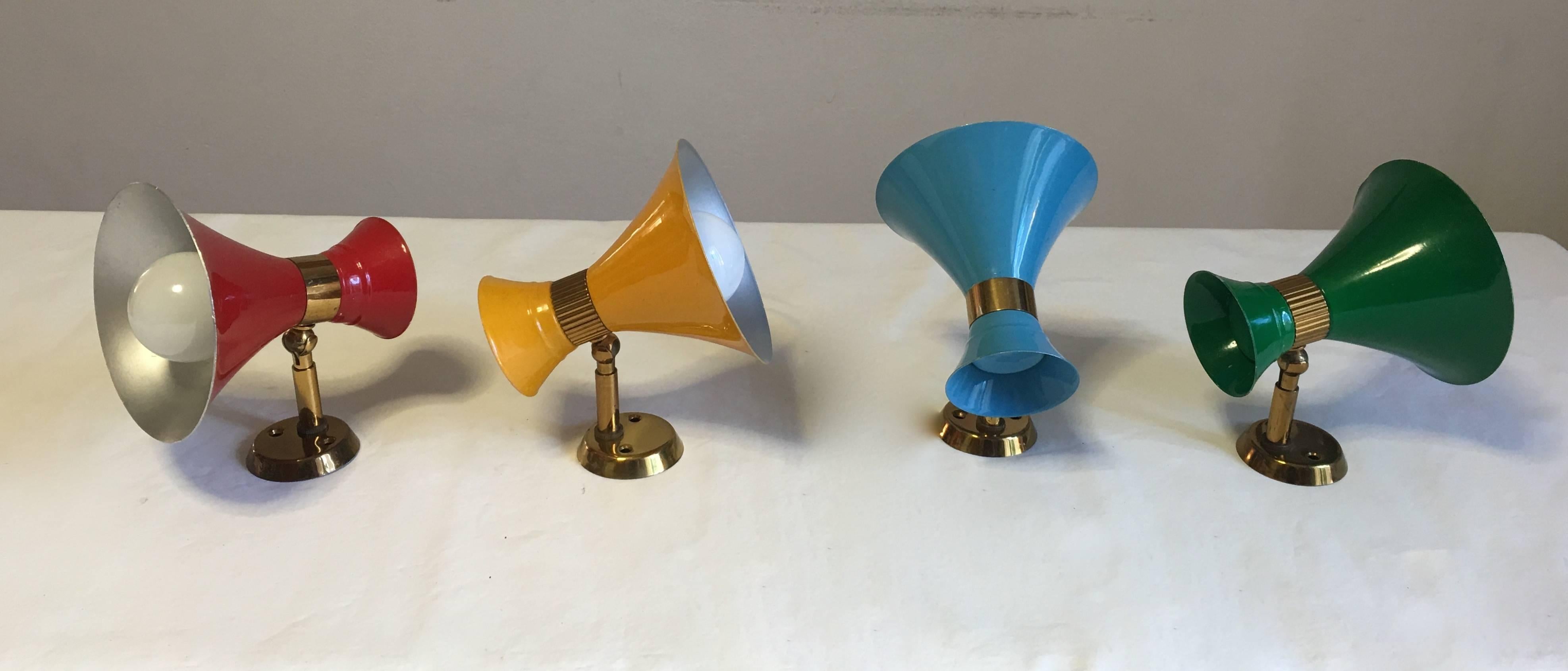 Colored Mid-Century wall lights with cone / diabolo design in brass and painted metal. Adjustable in several angles.