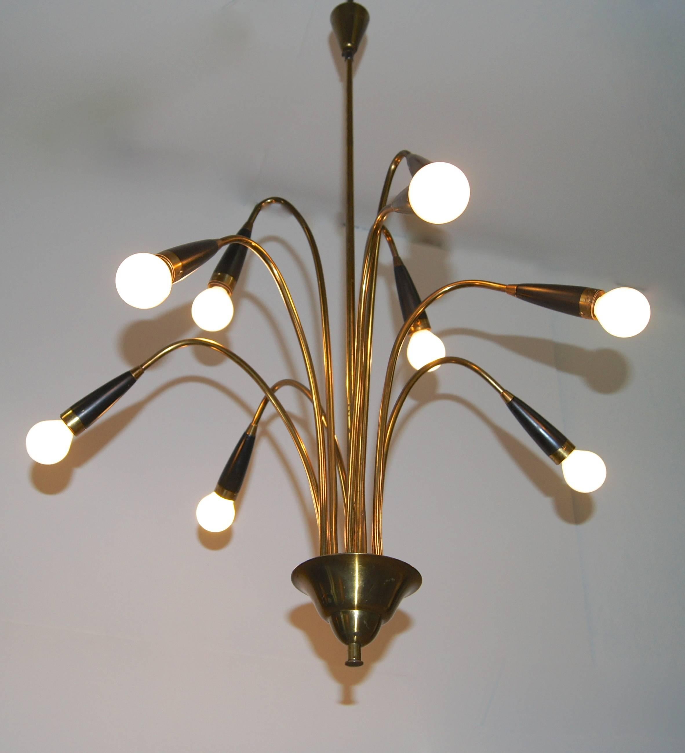 Mid-Century double tier chandelier in brass and black metal. Three arms on the top tier and six below. There is an extension pole that comes with this chandelier that can add another 40 cm to the 90 cm length of this light.