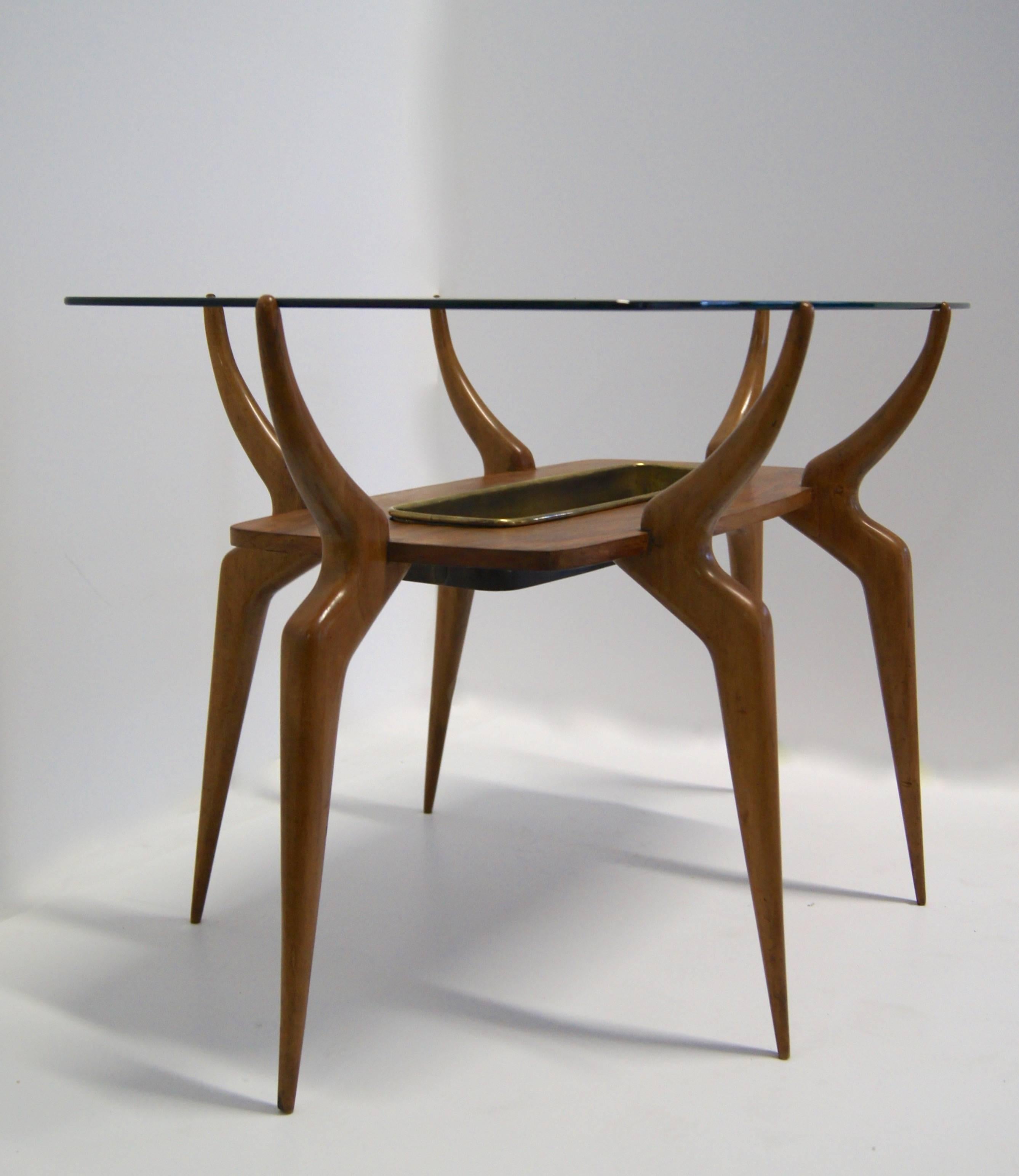 Sculptural spider-leg coffee or cocktail table with glass top and yellow copper removable tray or bar section,
Italian, circa 1950.