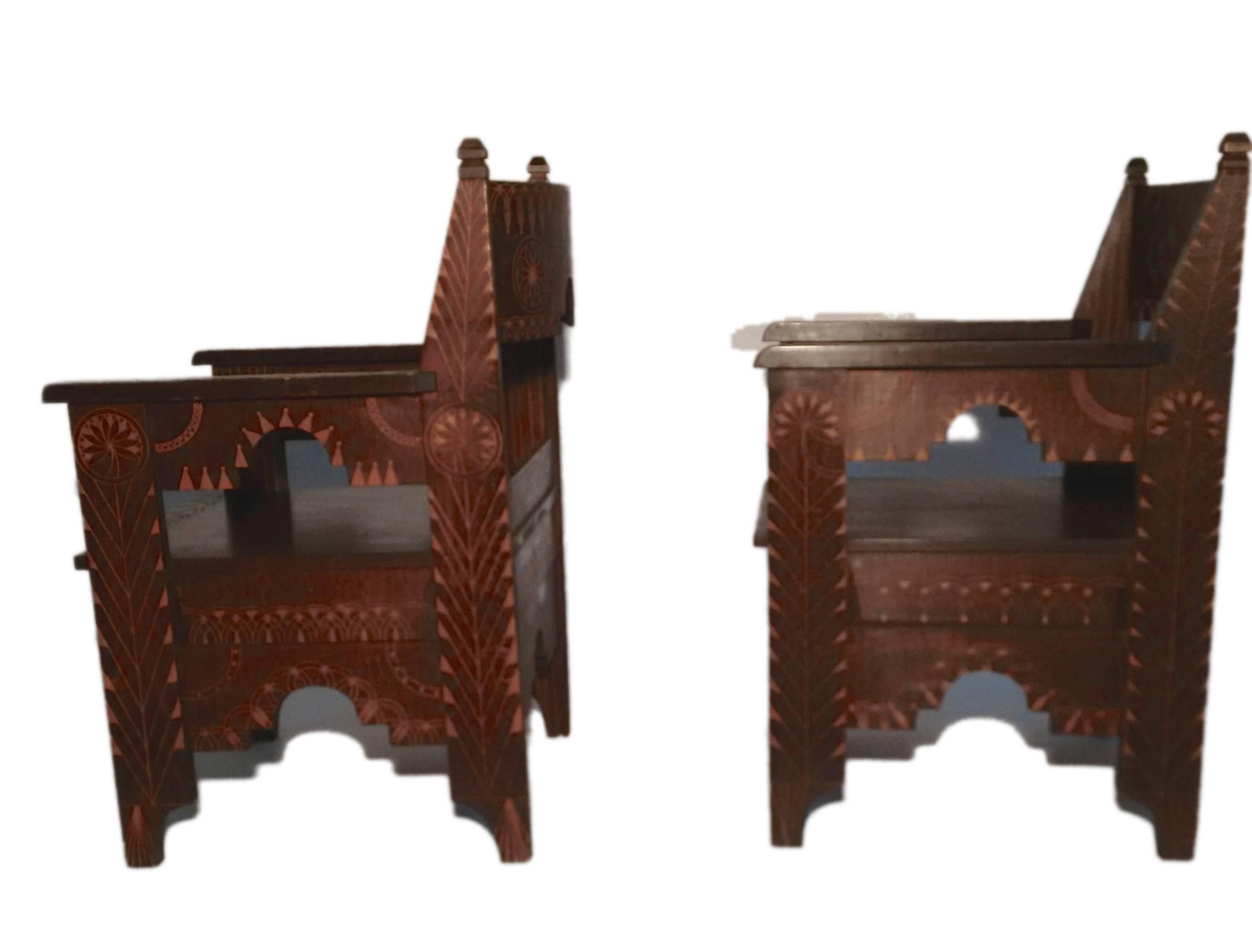 This is a very interesting and articulate pair of wooden chairs with carved Moorish pattern. Clearly a pair, they do differ slightly in pattern and there is a small height different between the two. Resembling a Classic design of Spanish wooden