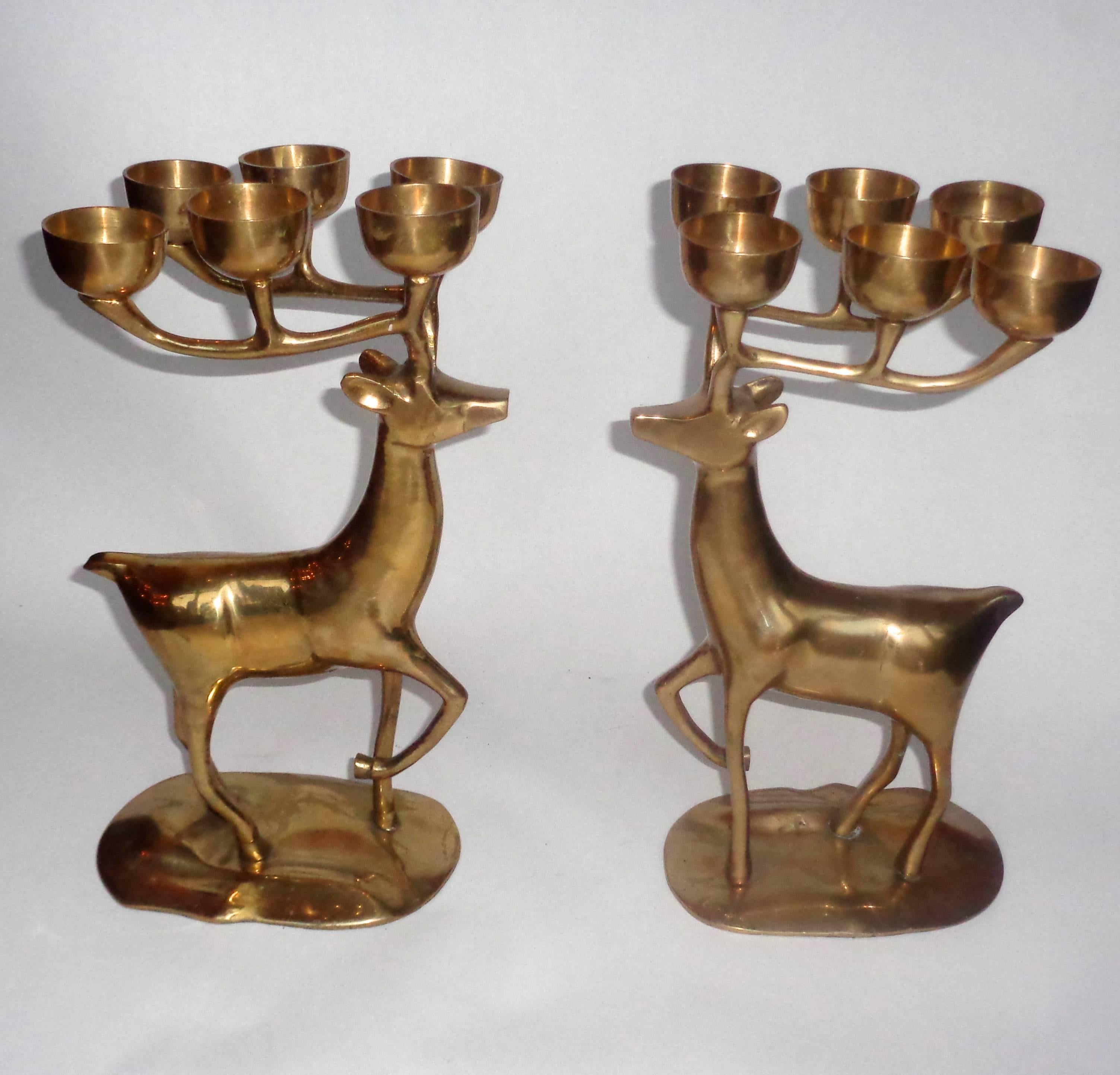 This large pair would be a wonderful feature on the holiday dinner table, but even out of the festive season they are a very decorative set of candelabra's.
They both carry 6 candle holders, with felt on the bottom of the base.
They have a