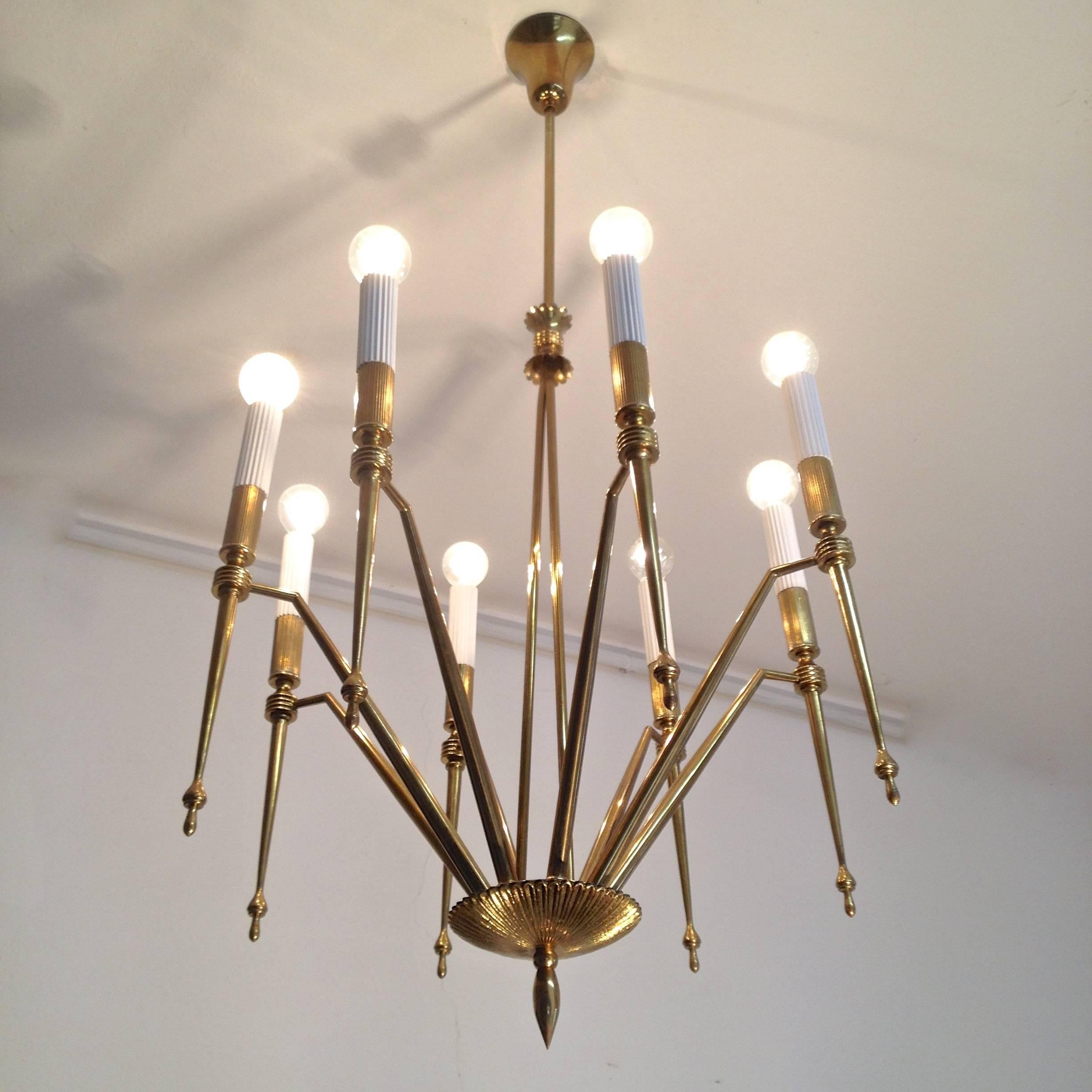 Very rare G.C.M.E. attributed chandelier with articulate design which is expressed in its lines. Note the double lines in the centre that give the chandelier a very nice dynamic. Modernist and glamorous. Elegant details.