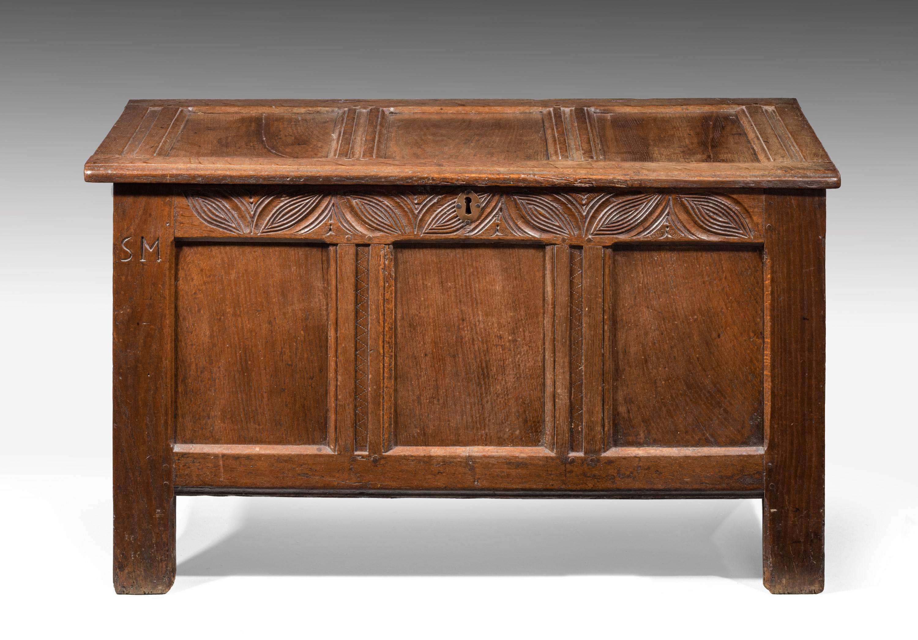 A early 18th century oak three-paneled Kist with a well carved top border. Replaced hinges.

A Kist (also called coffer or chest) is one of the oldest forms of furniture. It is typically a rectangular structure with four walls and a lift-able lid