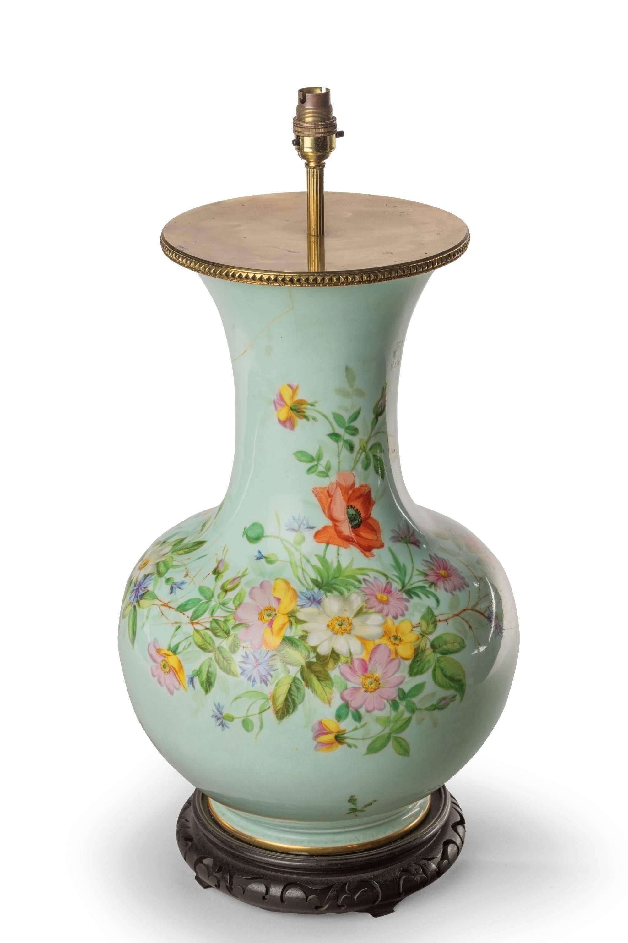A very large and well decorated, 19th century French porcelain vase. Enamelled with flowers and foliage. The top section repaired.

Shades are not included in the price of our lamps. We do have a competitively priced range of shades for all of our