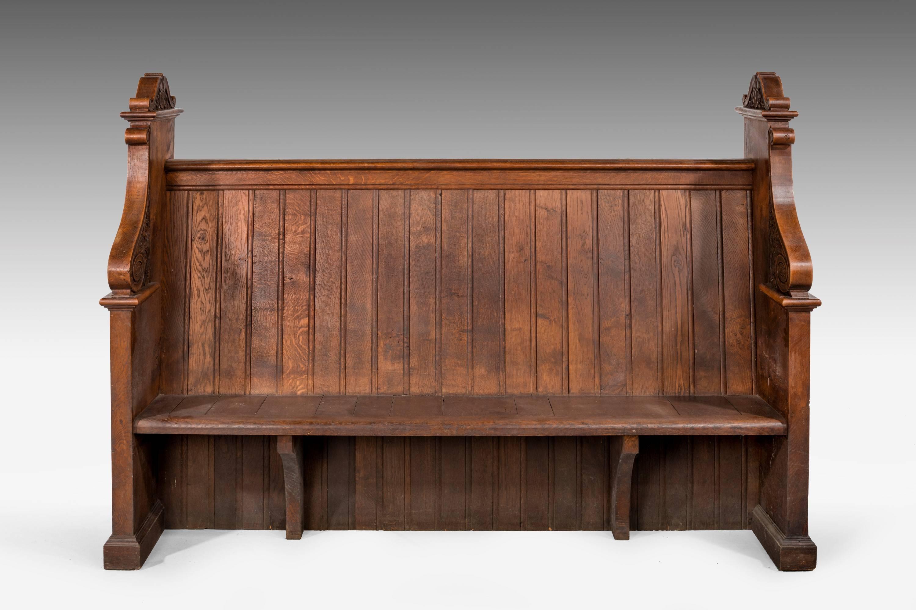 A pair of very well carved and designed Gothic oak pews. Shaped end supports. In excellent overall condition. A pair but available separately.

Seat height: 16 inches.