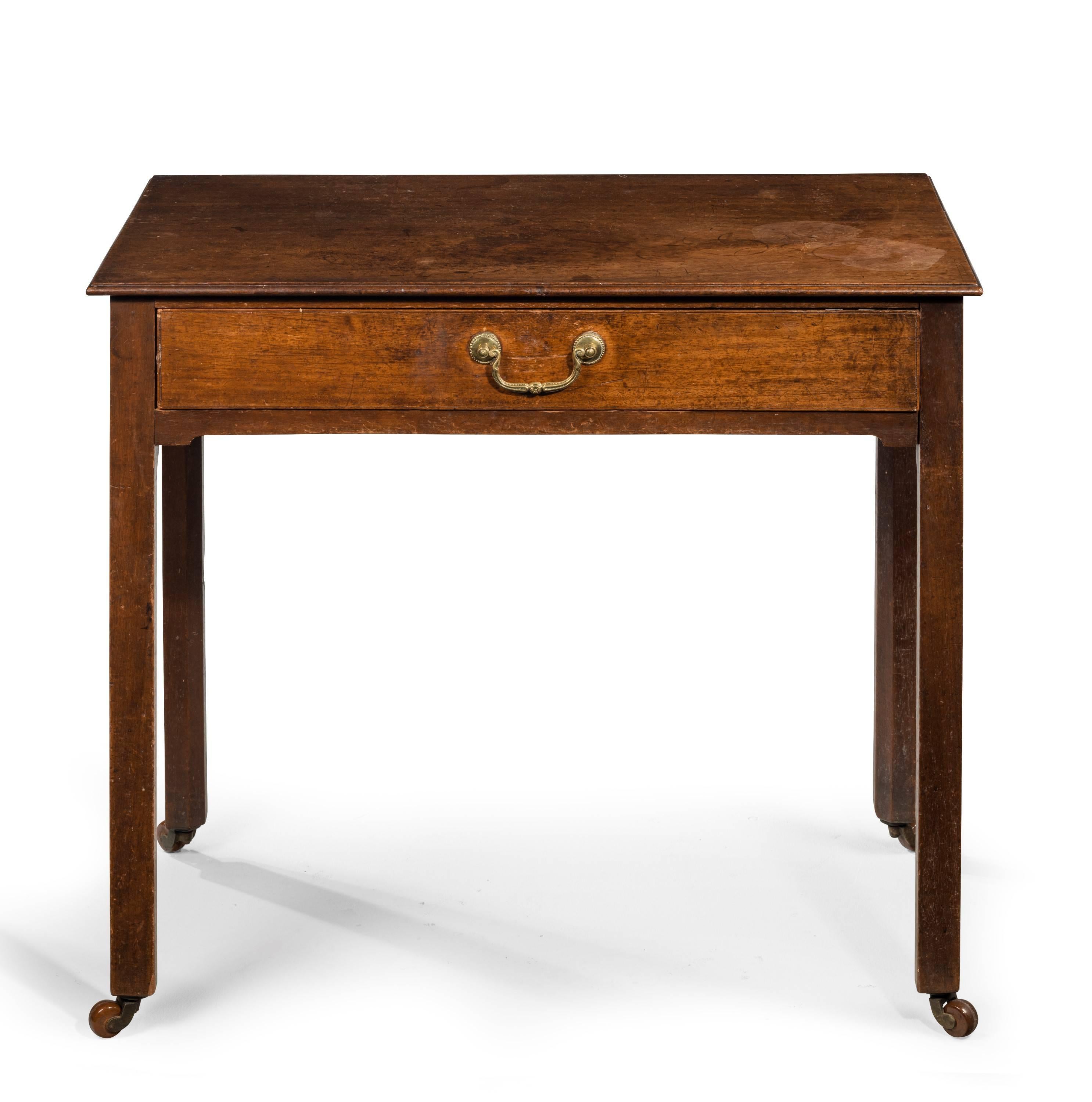 A good George III period mahogany side table. Single drawer, with very good original cast handle. Very well figured timber. Excellent original patina.