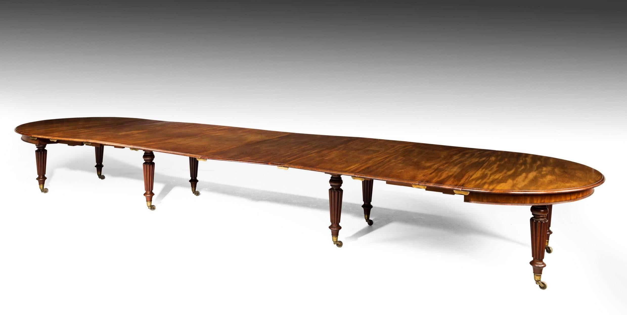 A quite important William IV period extending dining table in mahogany. Massive construction and retaining five original period leaves. Extremely good colour and patina. The supports shaped and reeded.

Width of separate leaves -
