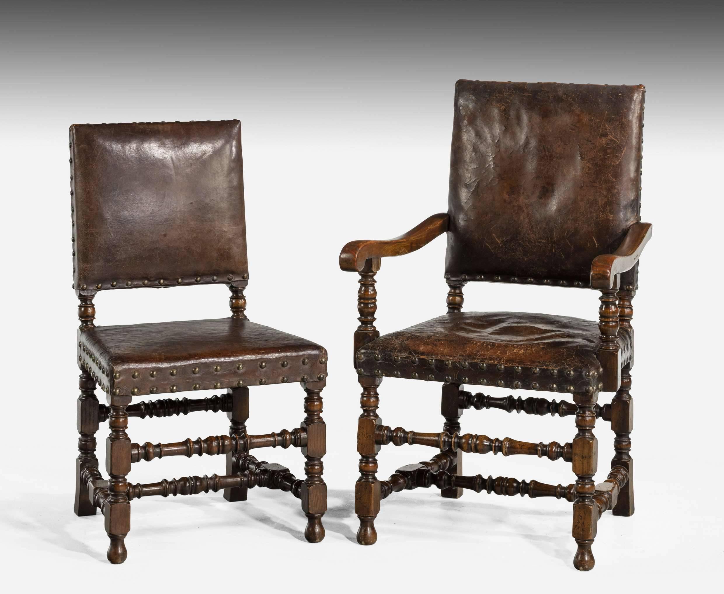 A good set of eight (six plus two) 17th century design oak chairs. Retaining approximately half of the original leather work. The other mainly the back section having been replaced many years ago. Excellent overall condition. From late 19th century.