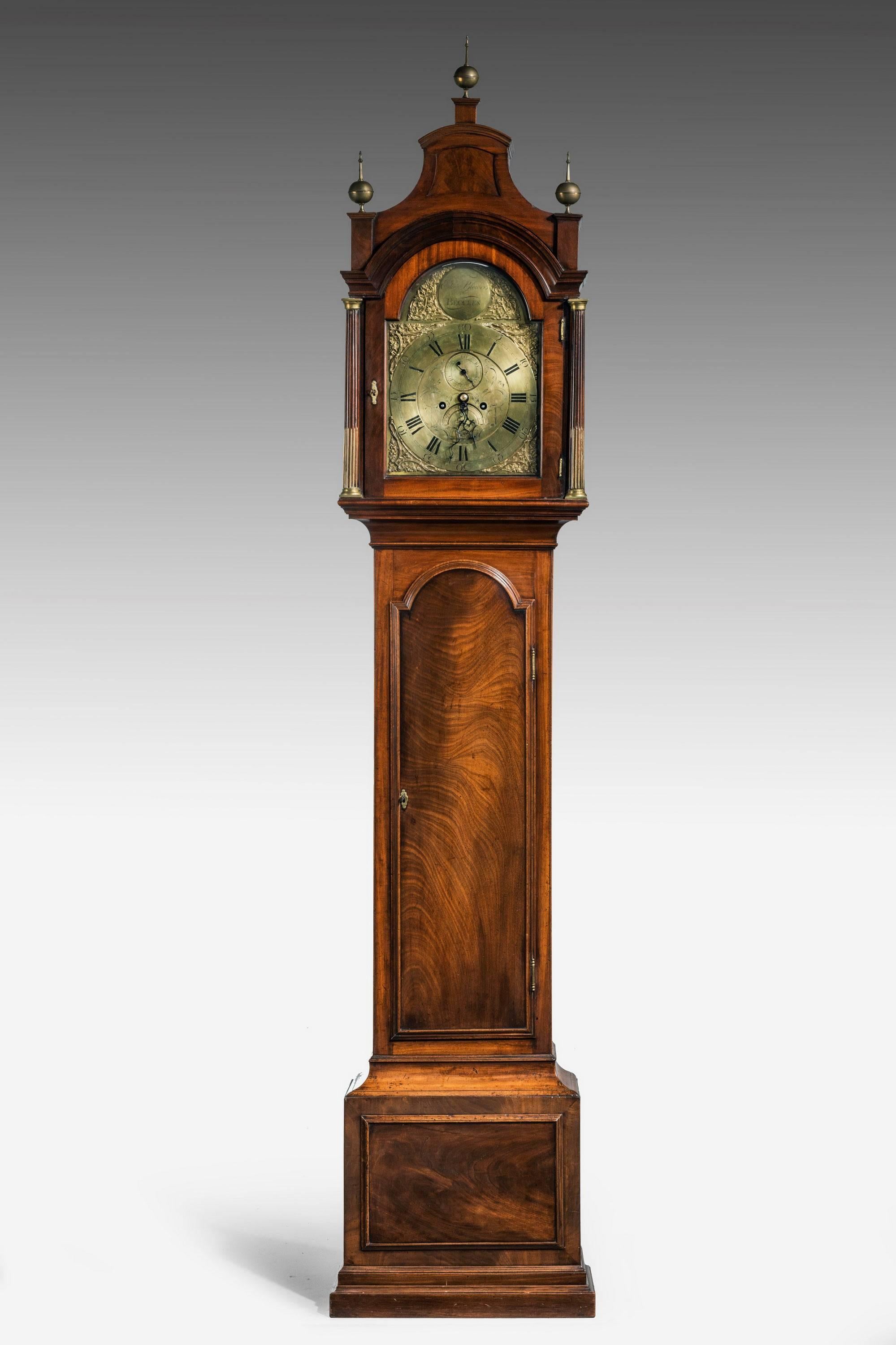 A George III period mahogany Longcase clock by Edward Blower of Beccles. The case in excellent original condition. Arch dial to the face with two subsidiary dials. The top with three period finals. Good color and the long door beautifully figured in