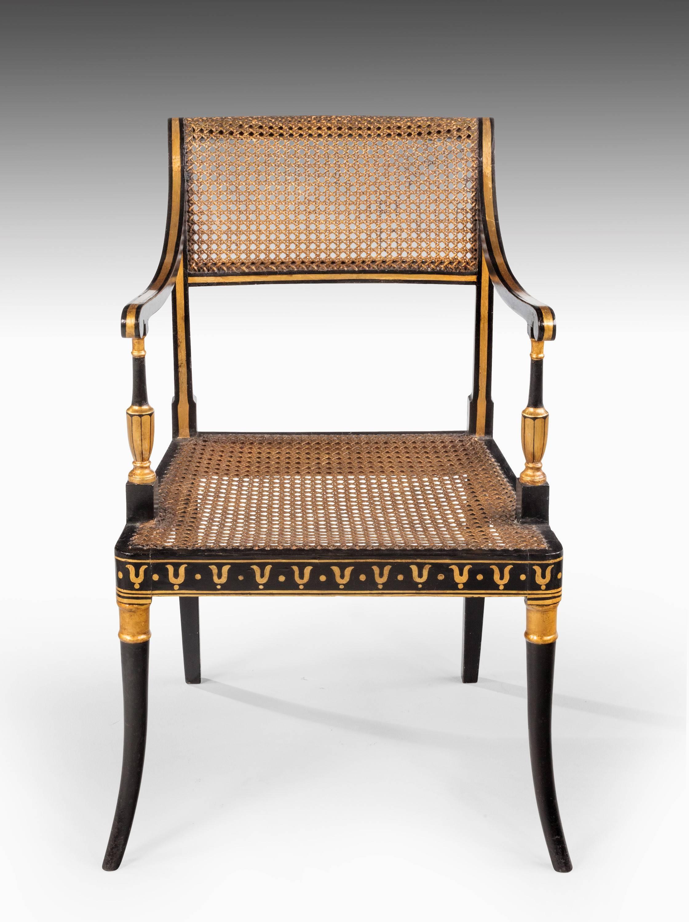 19th Century Set of Four Regency Period Lacquered and Parcel Gilt Elbow Chairs