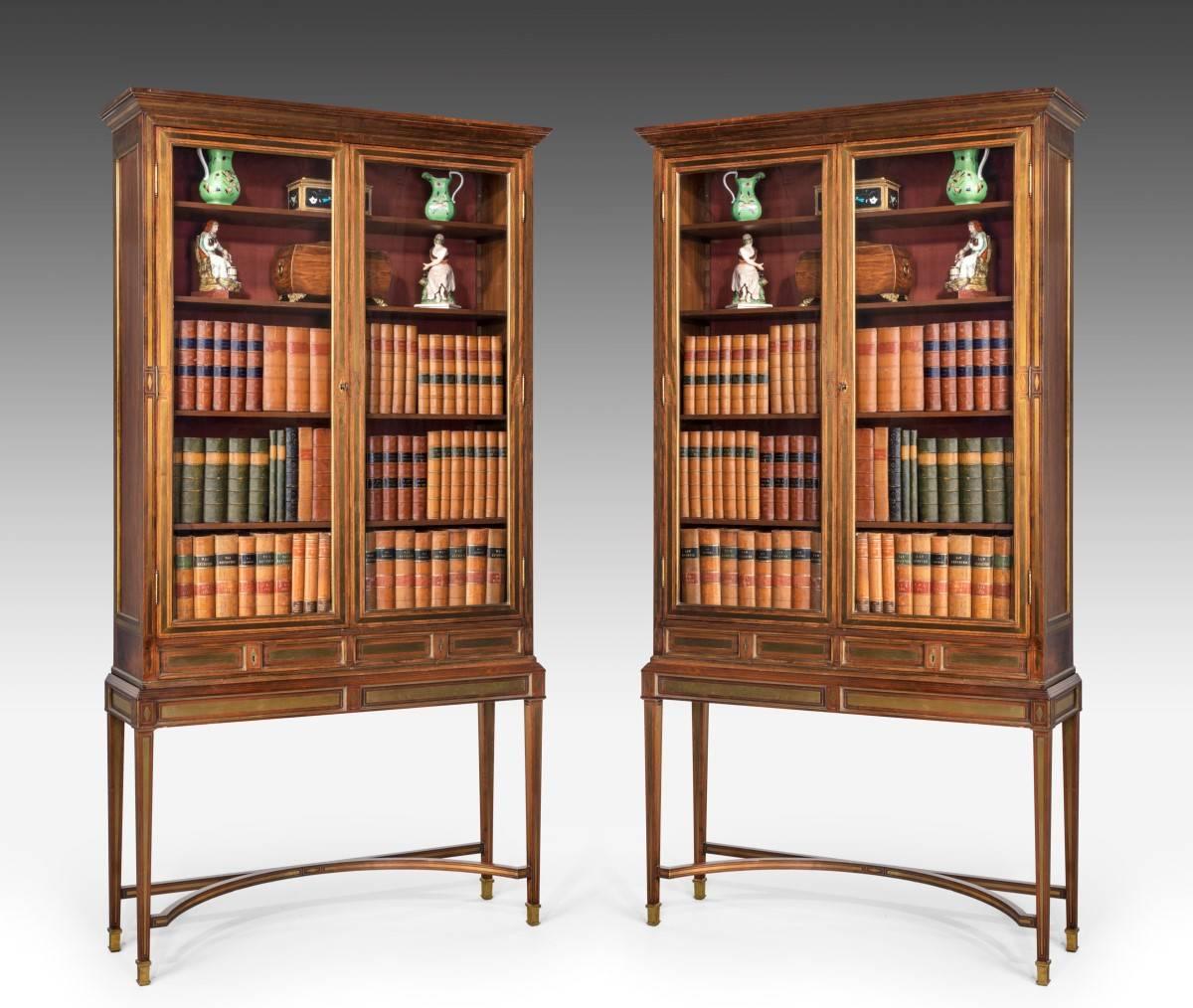 Pair of 20th century inlaid Russian display cabinets. Standing on four tapering legs united with a stretcher.