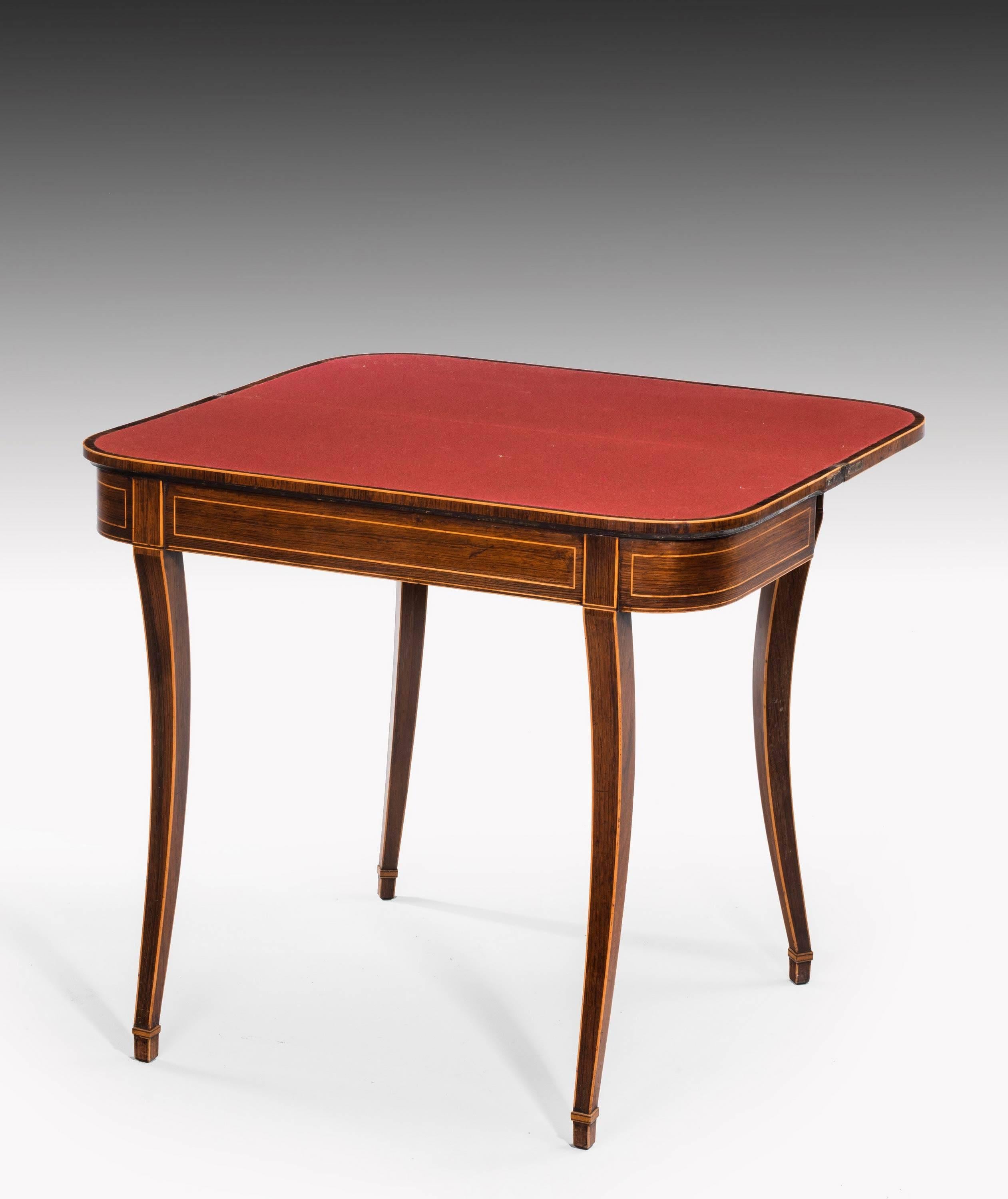 An elegant George III period mahogany card table of D form. Beautifully figured timbers with crossbanded edging to the top and the top edge with fine line ebony and boxwood. From a very good workshop

When open width 32.00 inches.

