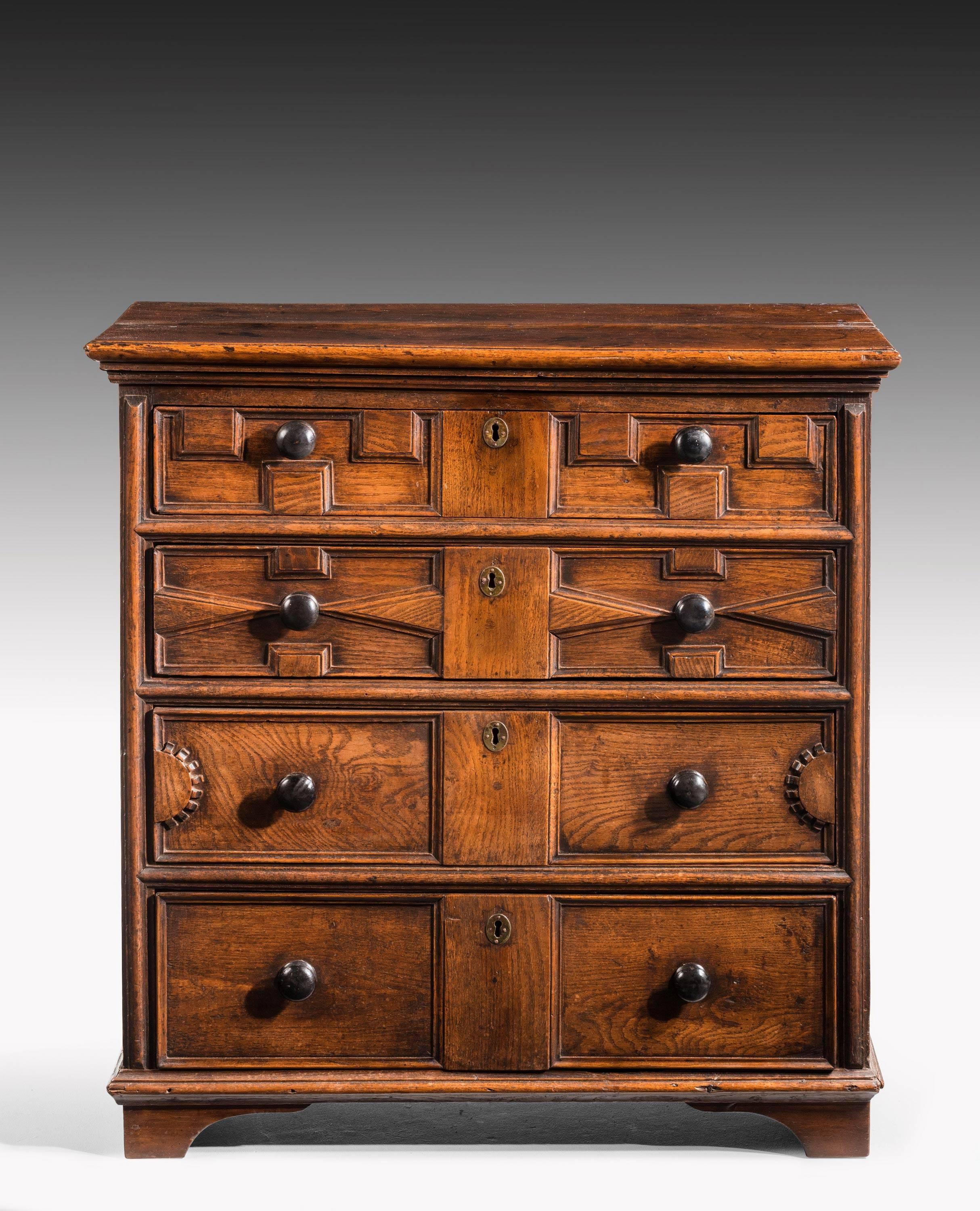 An attractive late 17th century oak chest of small proportions. The front elevations with Geometric patterns. Very good patina and color, the top particularly so.

 