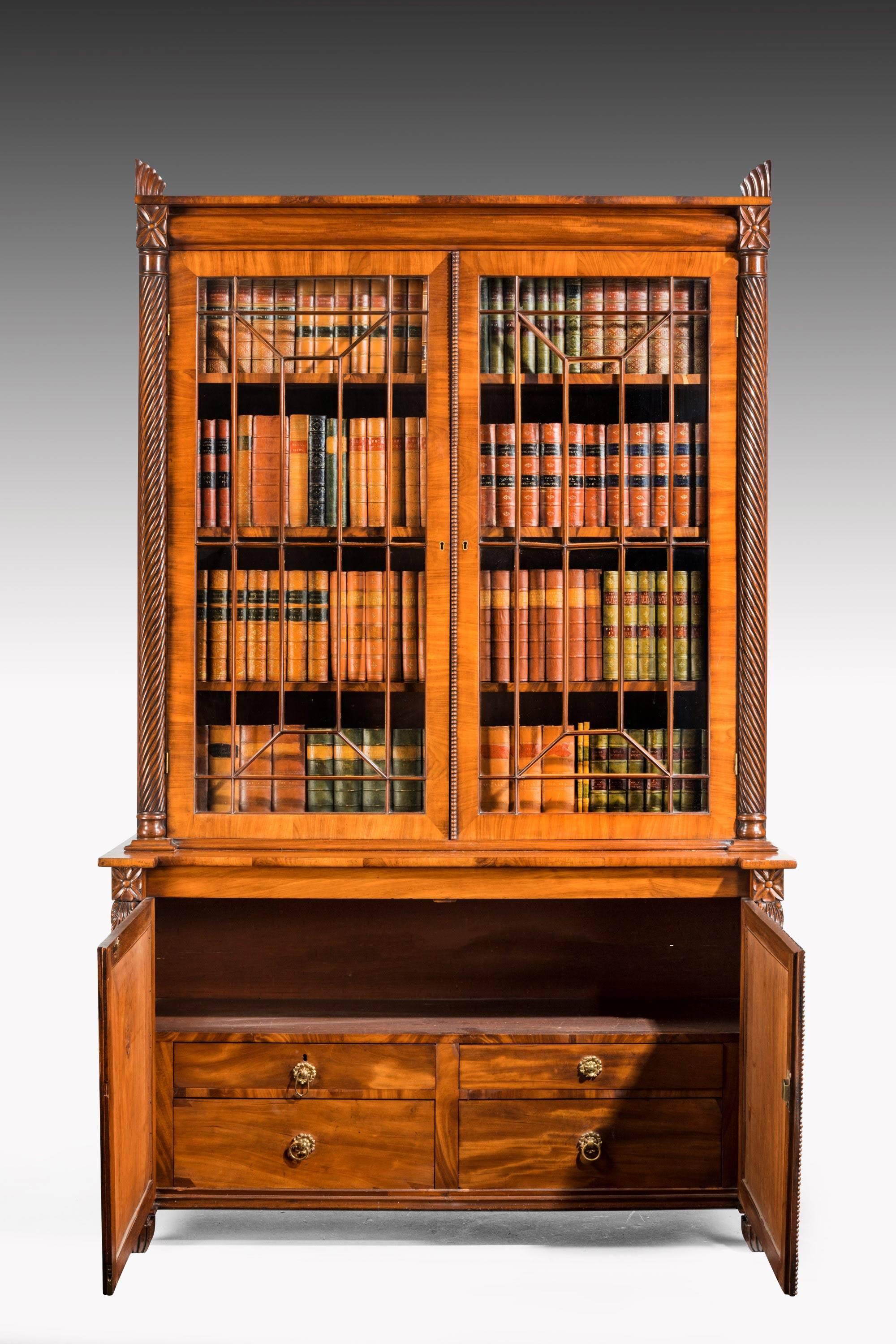 English Regency Period Mahogany Bookcase with Matching Flared Panels to the Bottom Doors