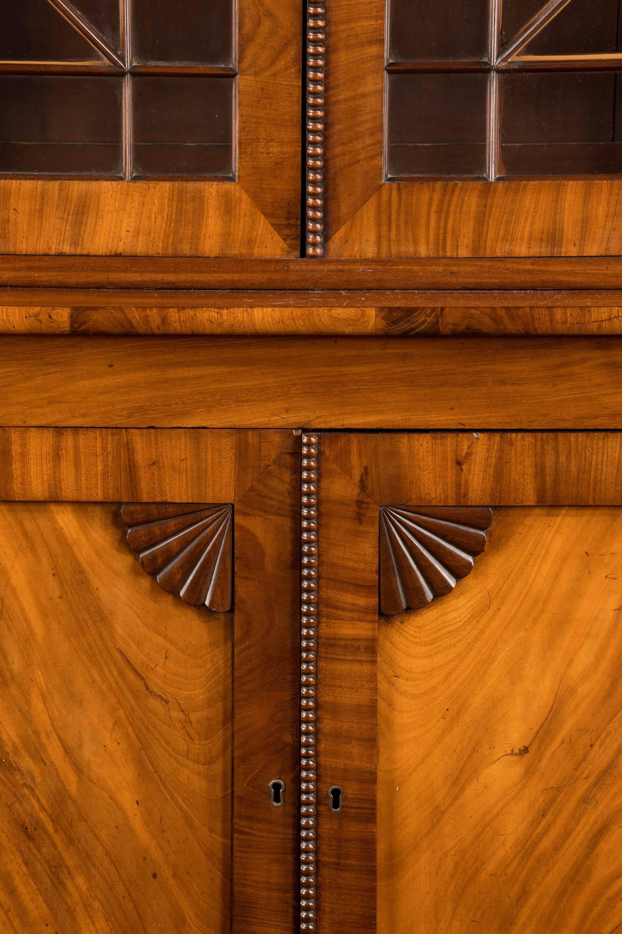 Regency Period Mahogany Bookcase with Matching Flared Panels to the Bottom Doors 3