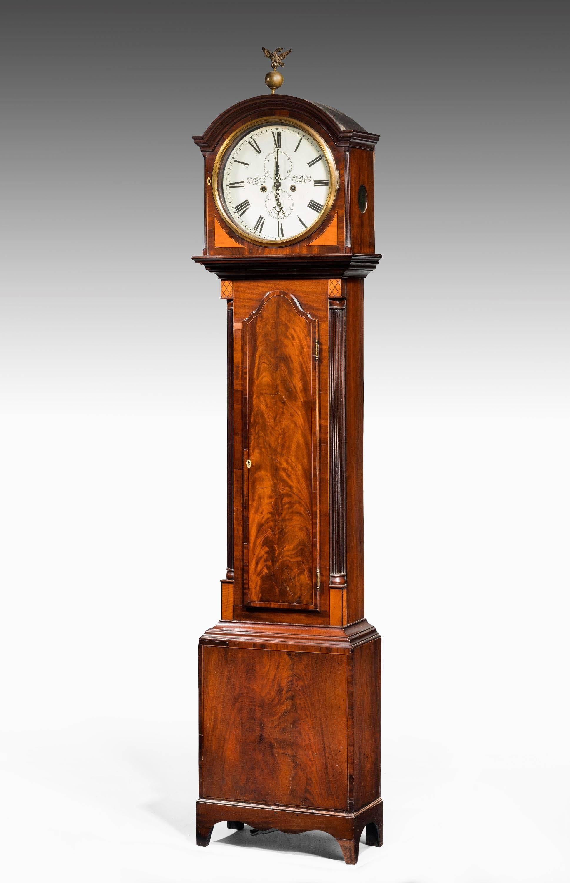 An early 19th century mahogany Longcase clock by William Coulie of Marykirk, with circular dial and two-train movement, the case being boxwood and ebony strung and with reeded quarter column corners.
Wm. Coullie, Marykirk not recorded in the