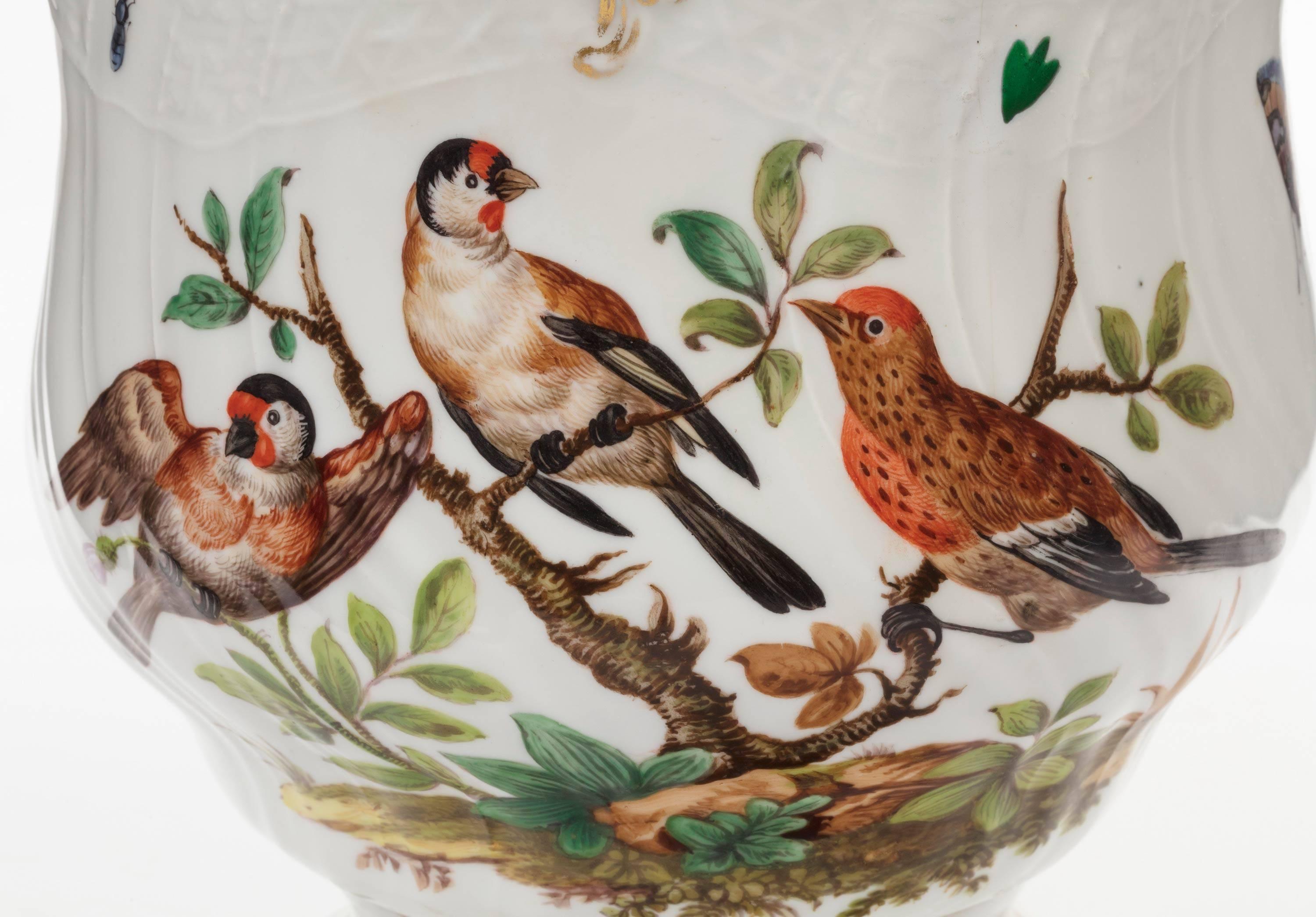 An unusual Meissen ice pale on shaped foot. Exotic birds and foliage. Cross swords mark.