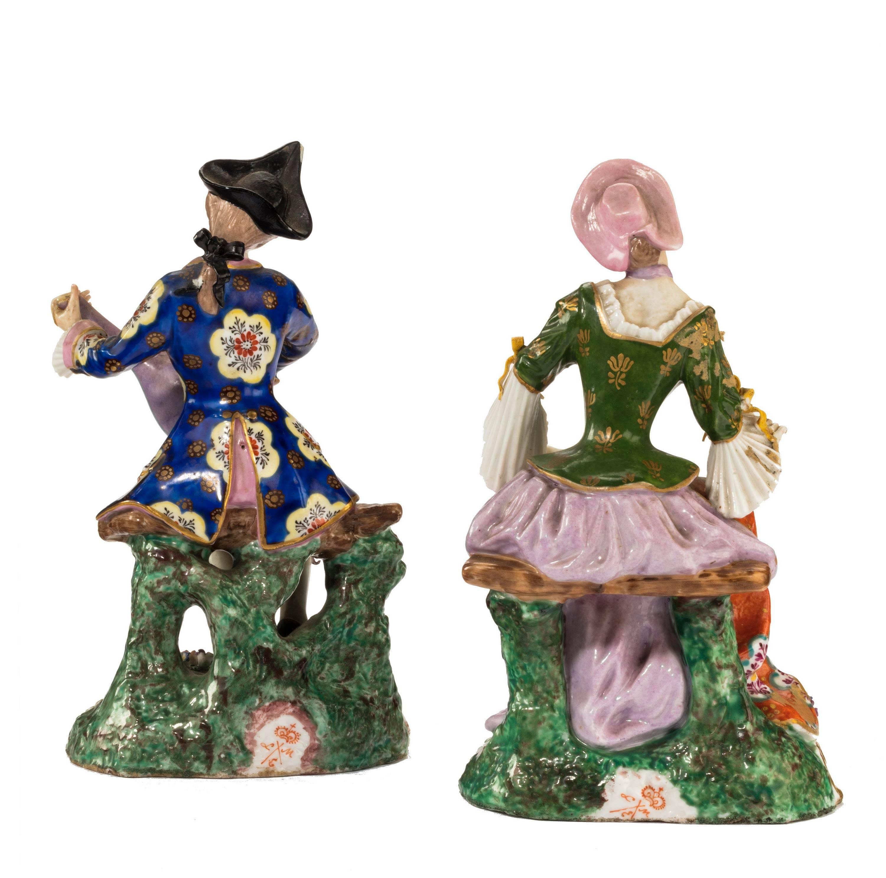 A pair of hard paste porcelain figures. Excellent overall condition, minor chips to a hand and a hat.

Smaller measures -

Height 6.5 inches
Width 4 inches
Depth 3.5 inches.
