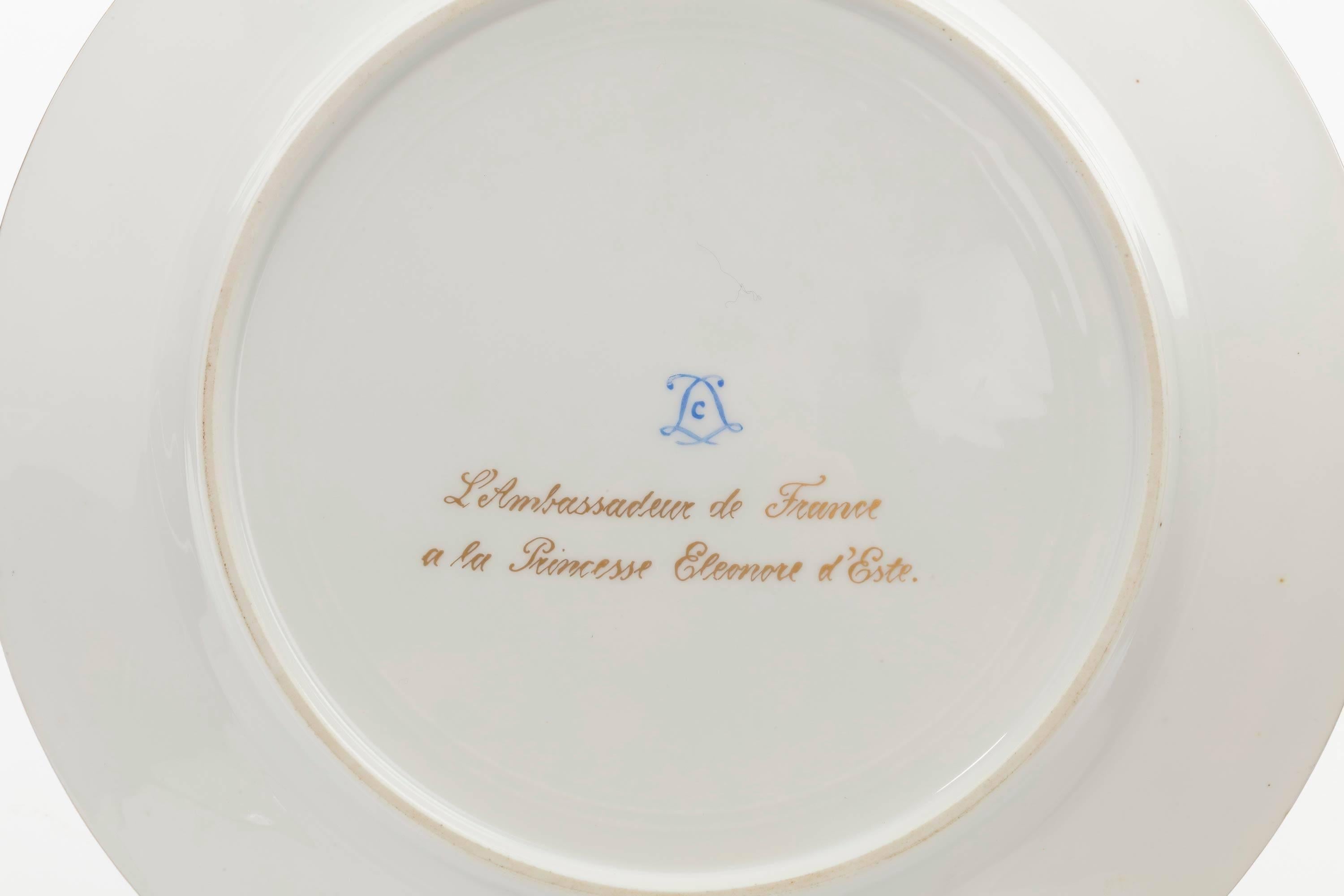 A good pair of late 19th century serve porcelain enameled plates with gold script verso 