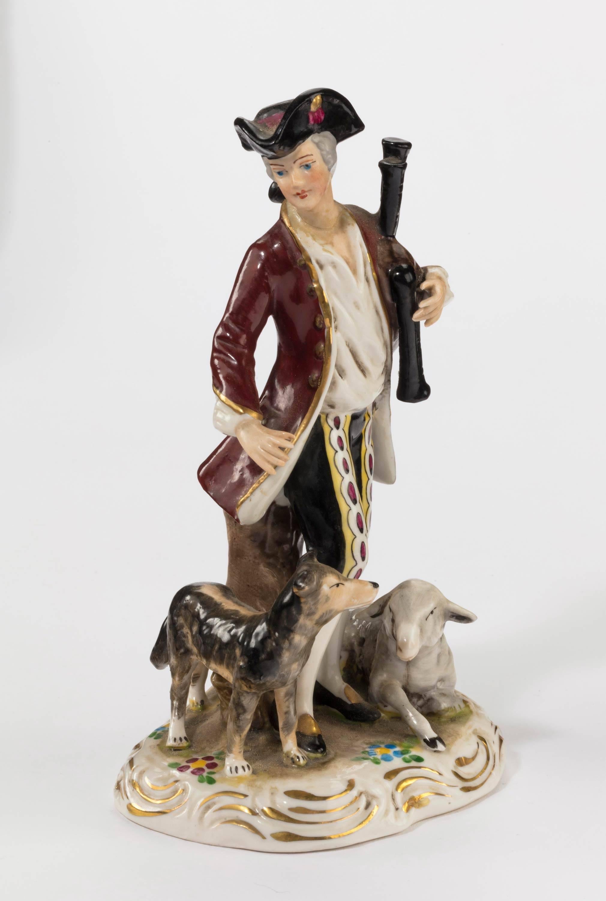 English Pair of Early 20th Century Continental Porcelain Figures of Huntsman and Animals For Sale