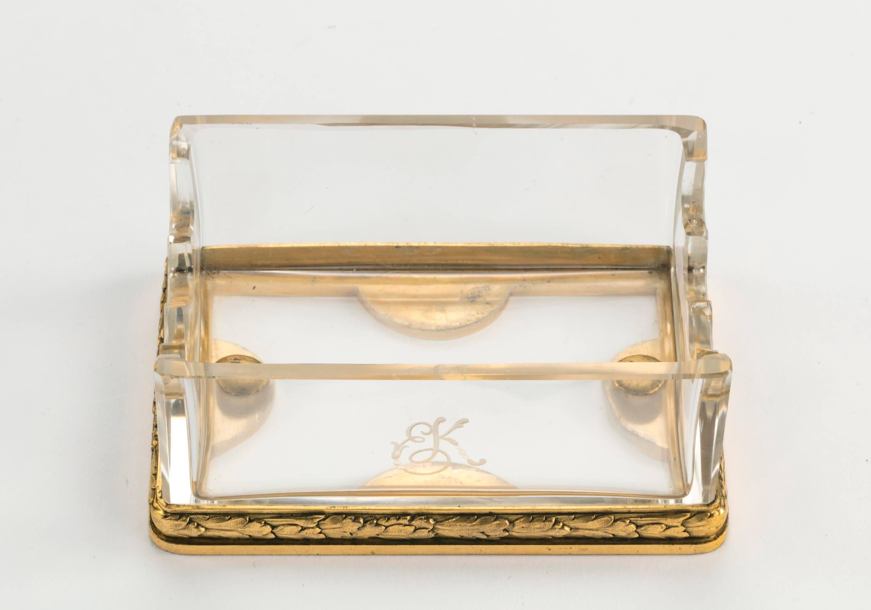 A gilt bronze and glass shaped pen holder. Signed with the hallmark of A. Risler & Carre, Paris.