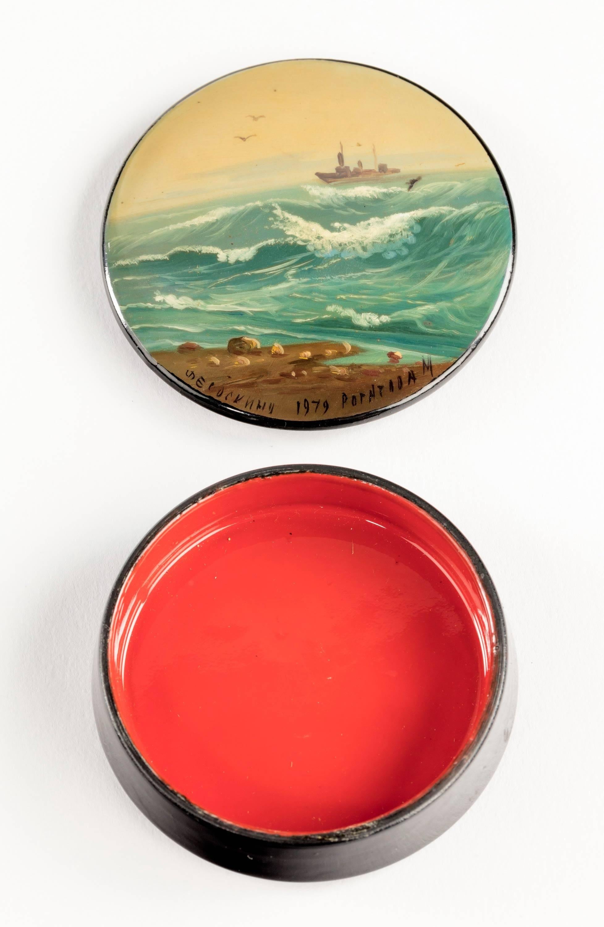 Four Russian lacquered small boxes with hand-painted scenes. Marked on the bases “Made in Russia” 

The oval box

Height 1.75 inches
Diameter 1.75 inches.
       