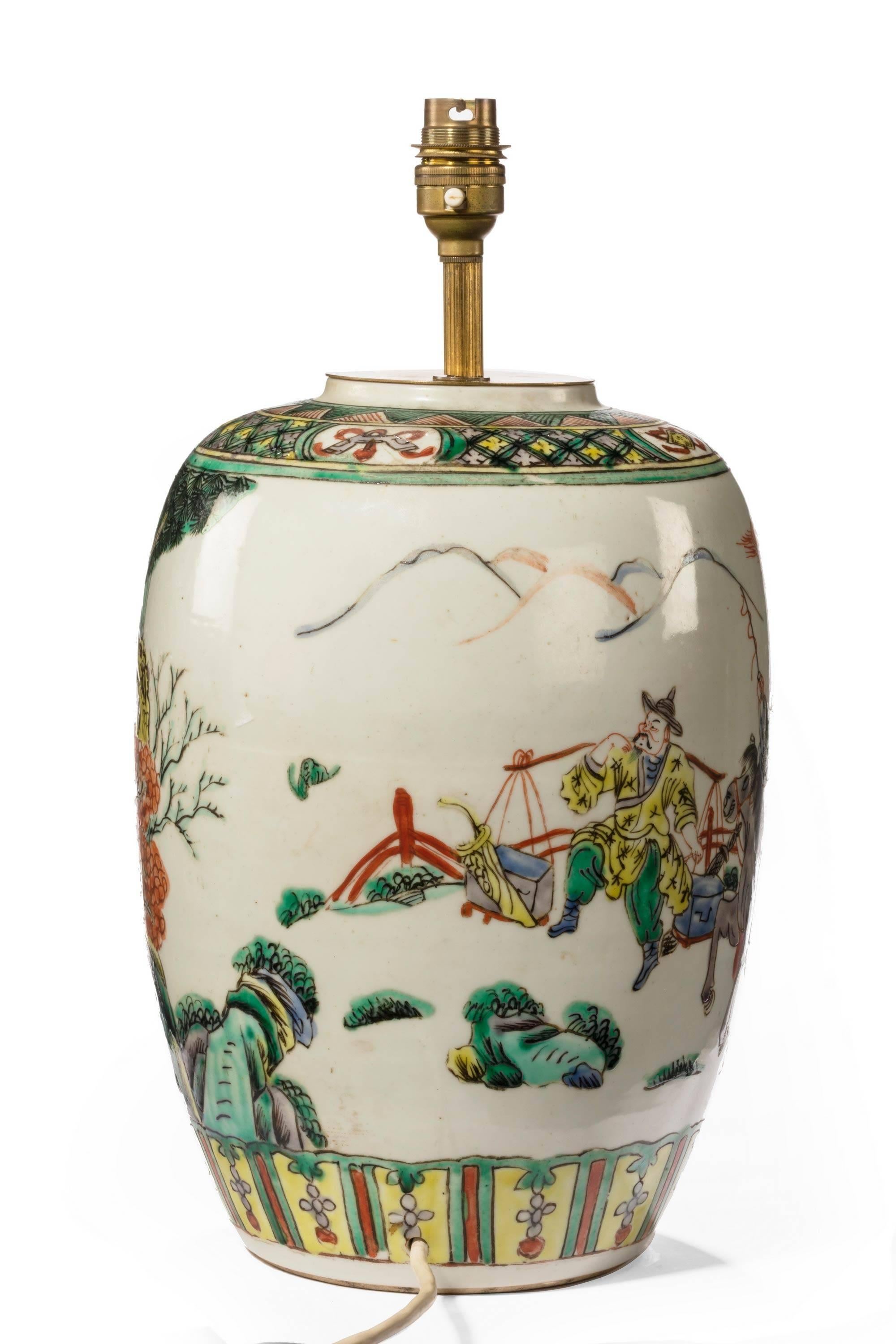 An attractive famille verte vase lamp. Finely painted figures in an interior of foliage and trees. Very good strong colors and fine original condition.