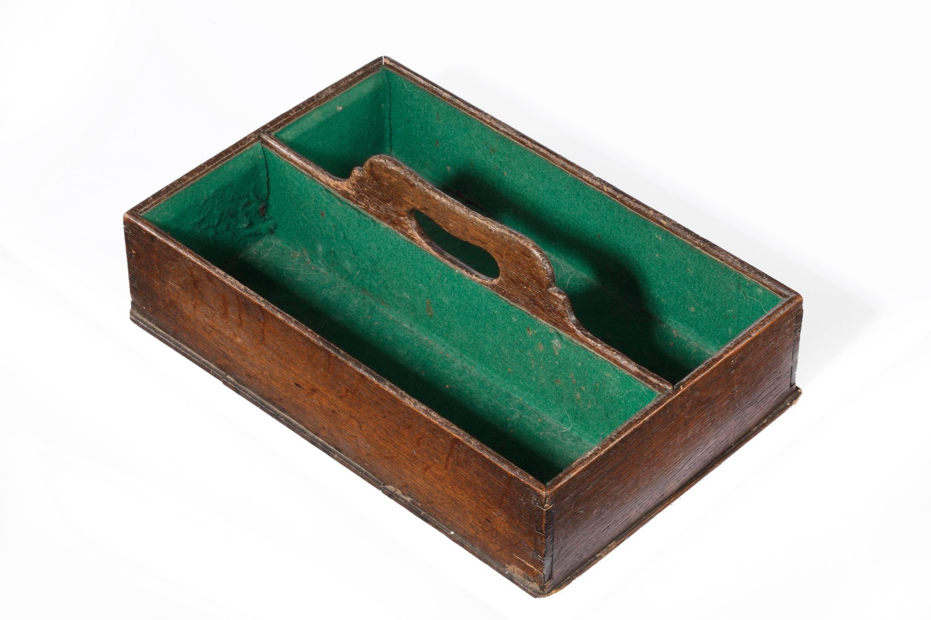 A George III period mahogany two division cutlery box. The handle now showing patina and wear. In good country house condition.