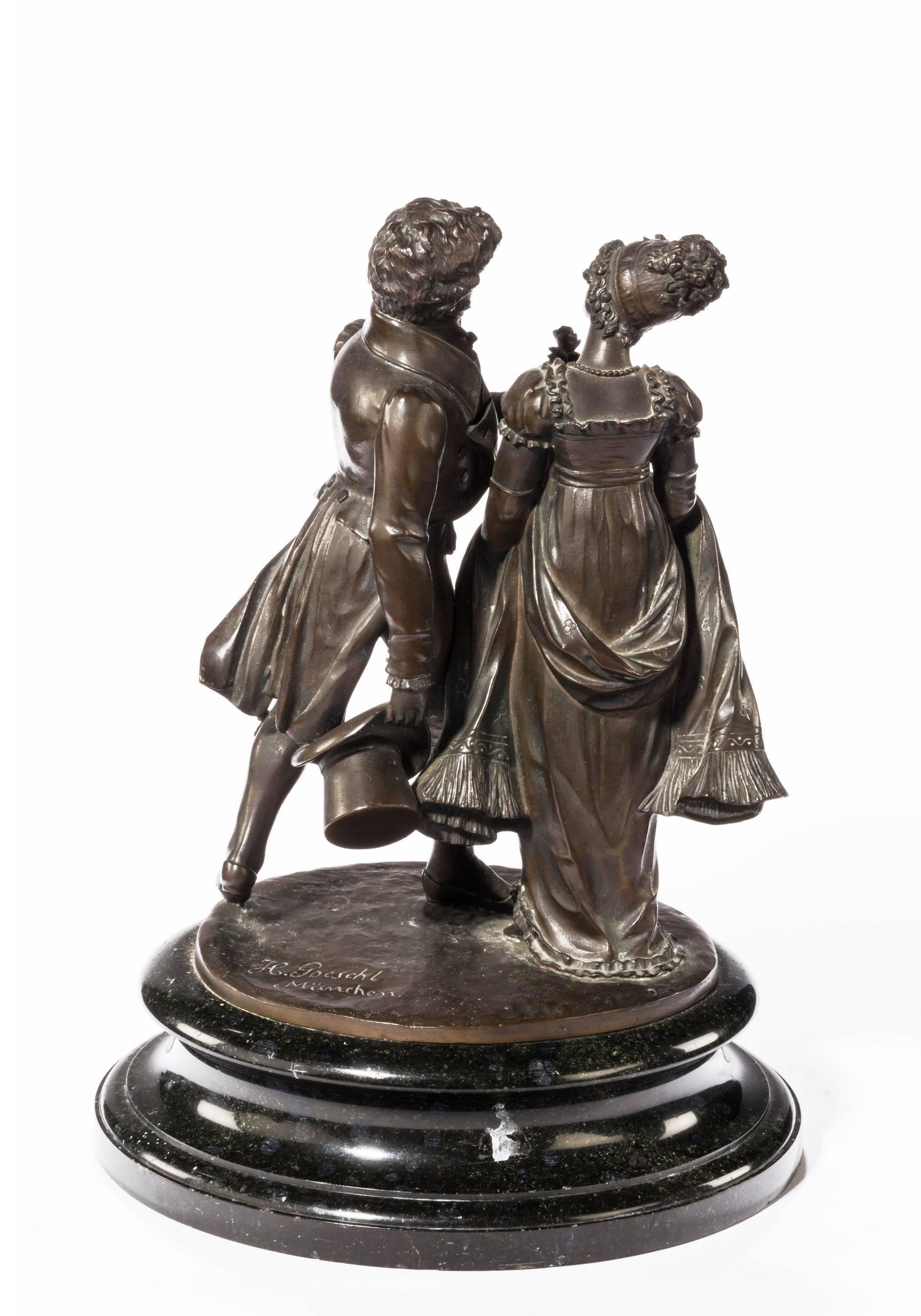 A well modelled pair of German bronze figures on original dark marble stand signed H. Goeschl München.