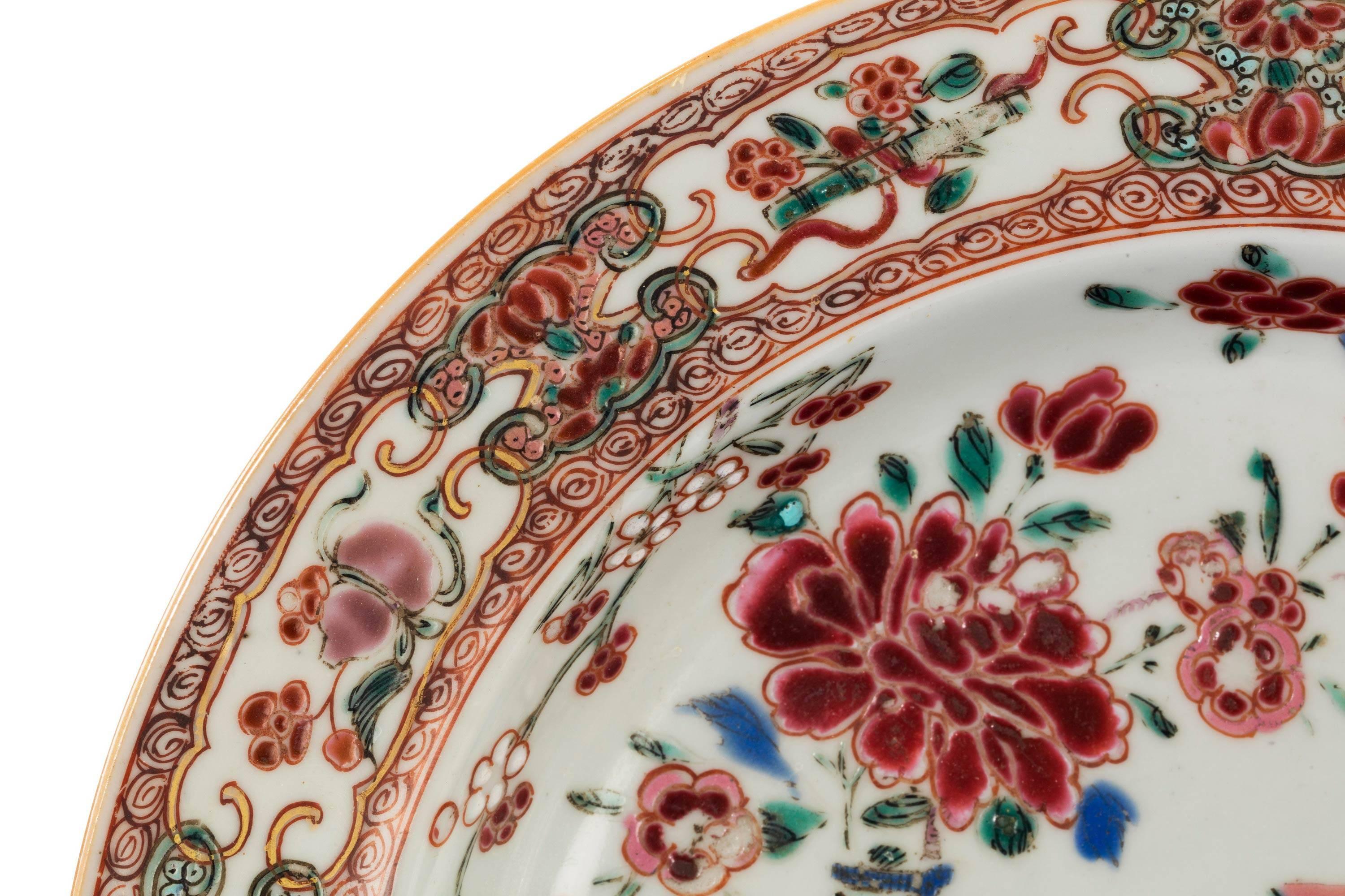 A finally painted and gilded Cantonese famille rose dish with typical border decoration. Excellent overall condition.