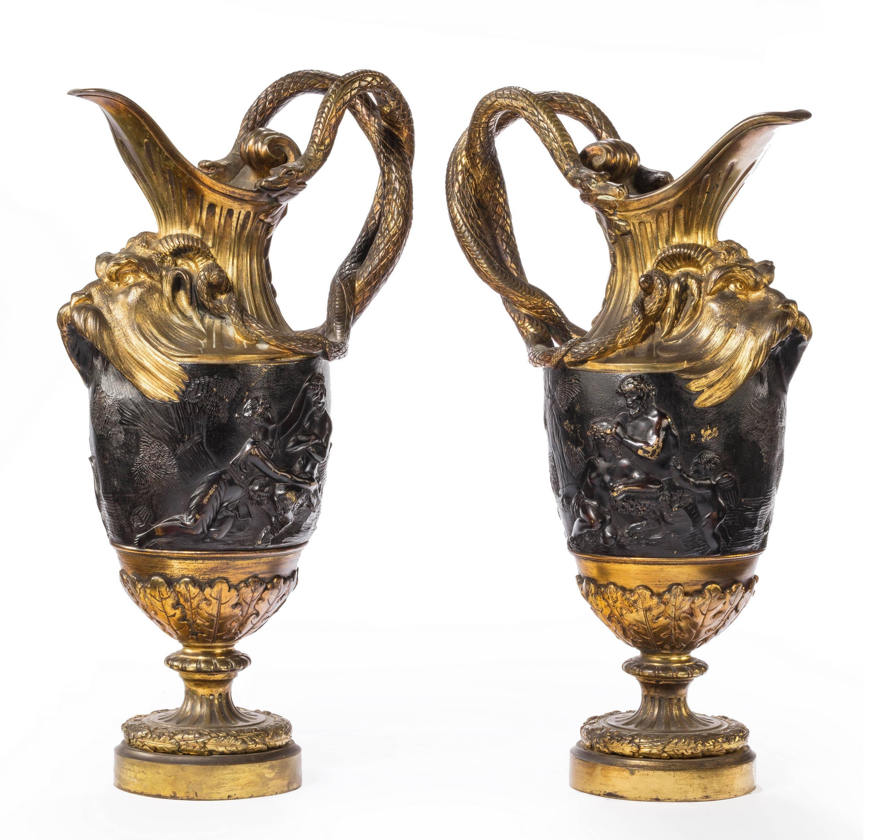 English Pair of Late 18th Century, Bronze and Gilt Bronze Ewers in the Manner of Clodion