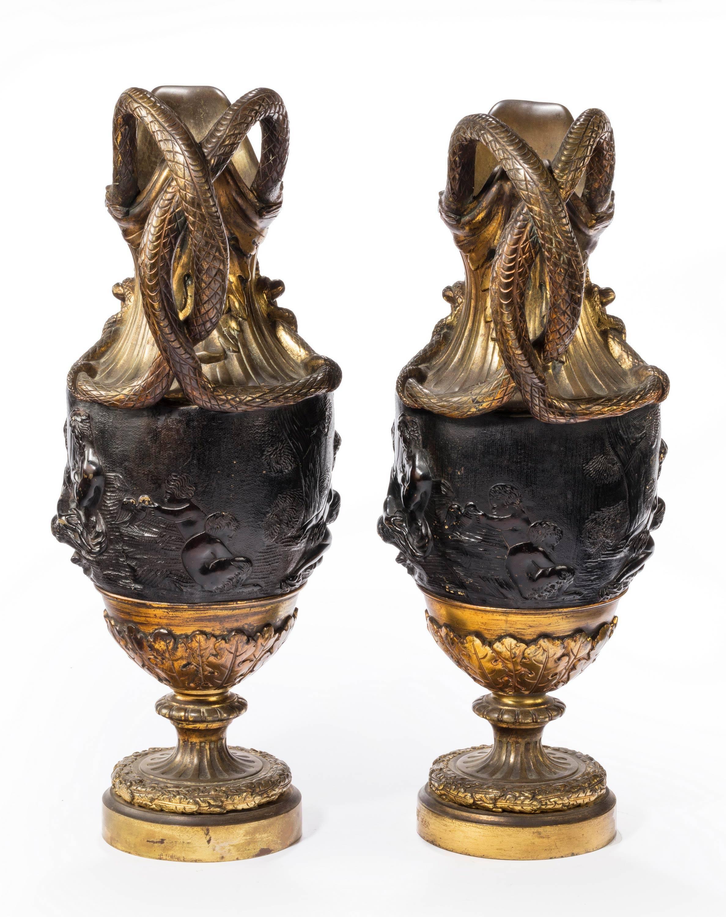 Pair of Late 18th Century, Bronze and Gilt Bronze Ewers in the Manner of Clodion 1