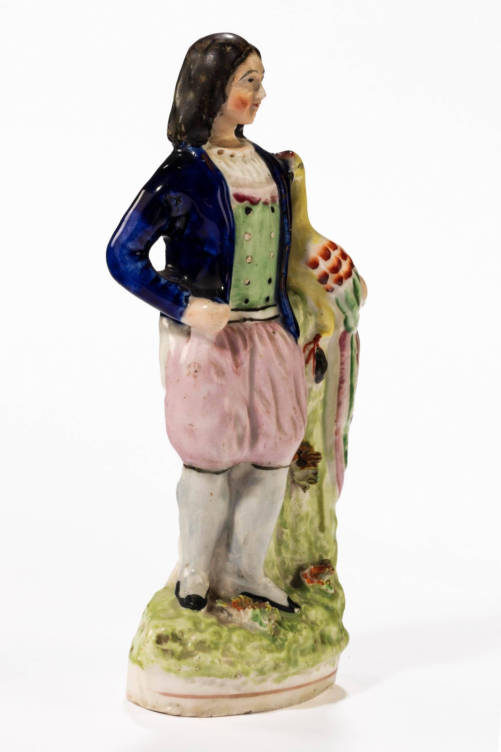Late 19th Century, Staffordshire Figure of a Young Lady Holding a Peacock In Excellent Condition In Peterborough, Northamptonshire