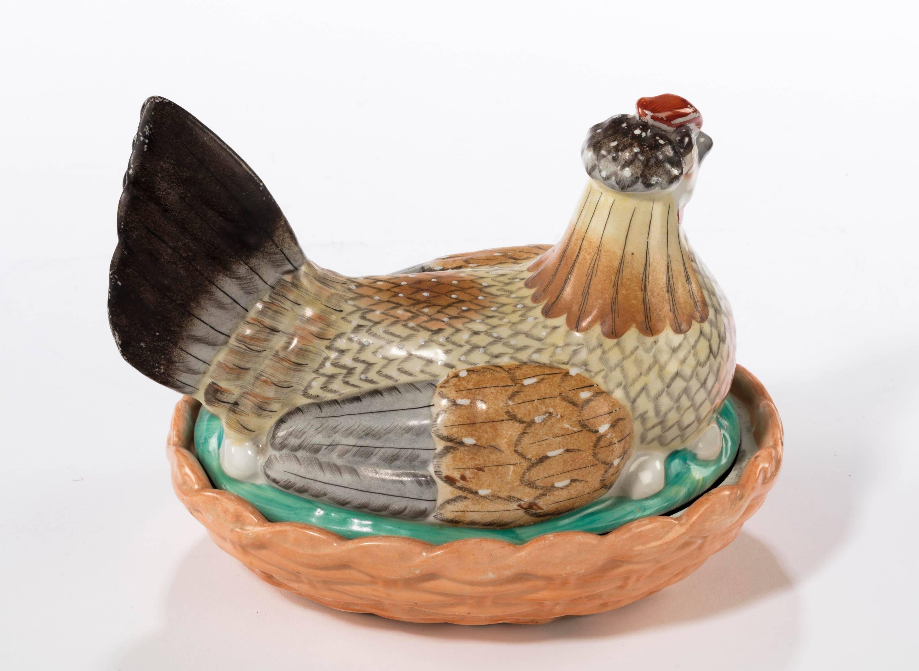 A highly colored Staffordshire 19th century hen basket. The base with a small age crack otherwise in excellent condition.