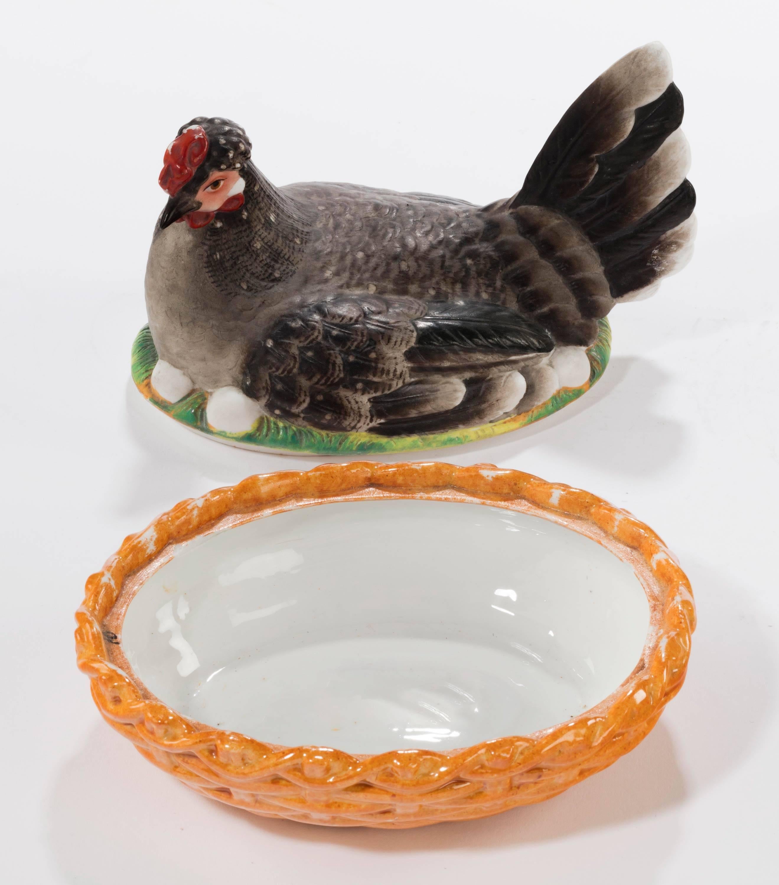 A well colored 19th century oval hen basket in excellent overall condition.