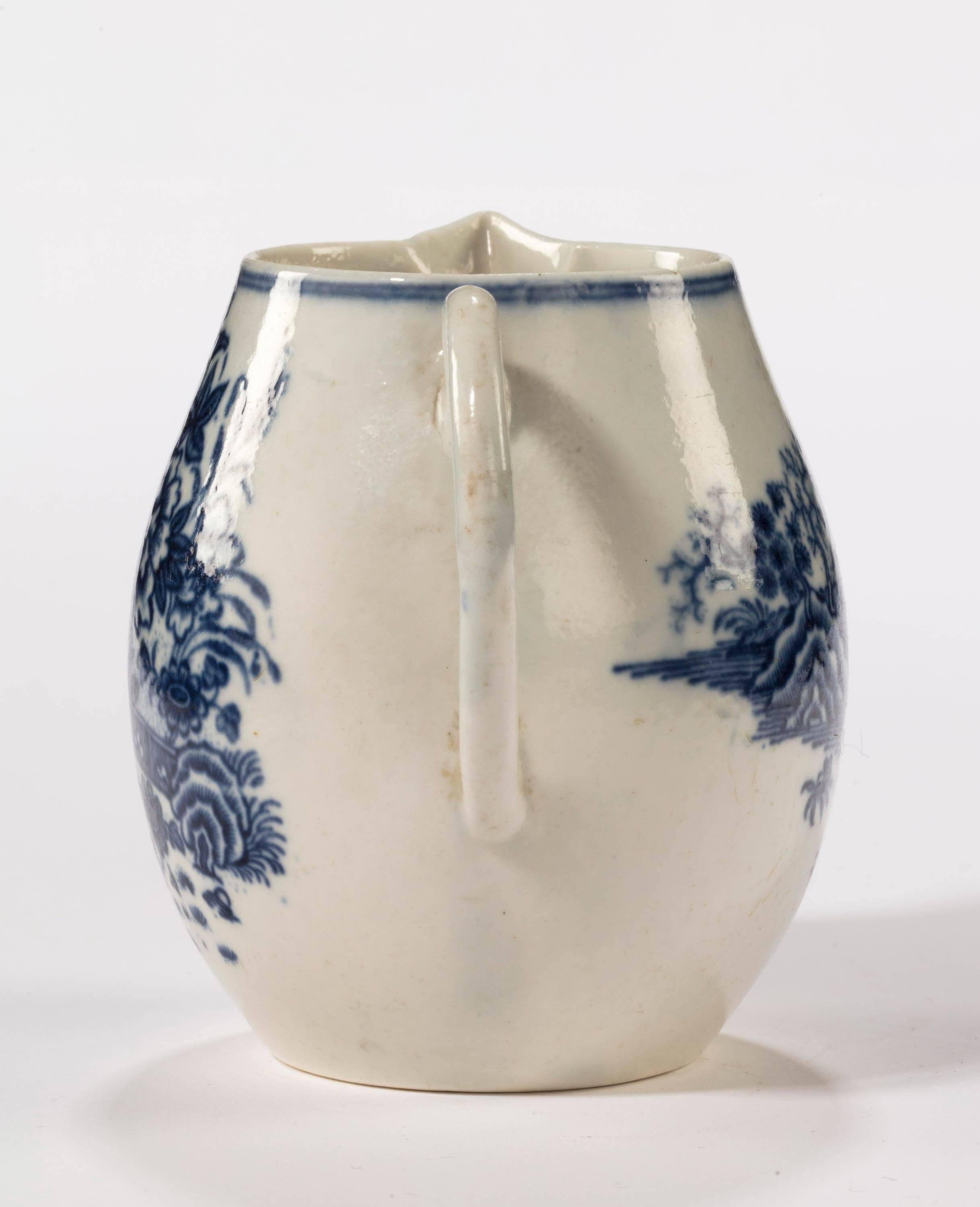 An attractive Liverpool blue and white printed jug of baluster form. A very minor chip to the inside of the top rim.