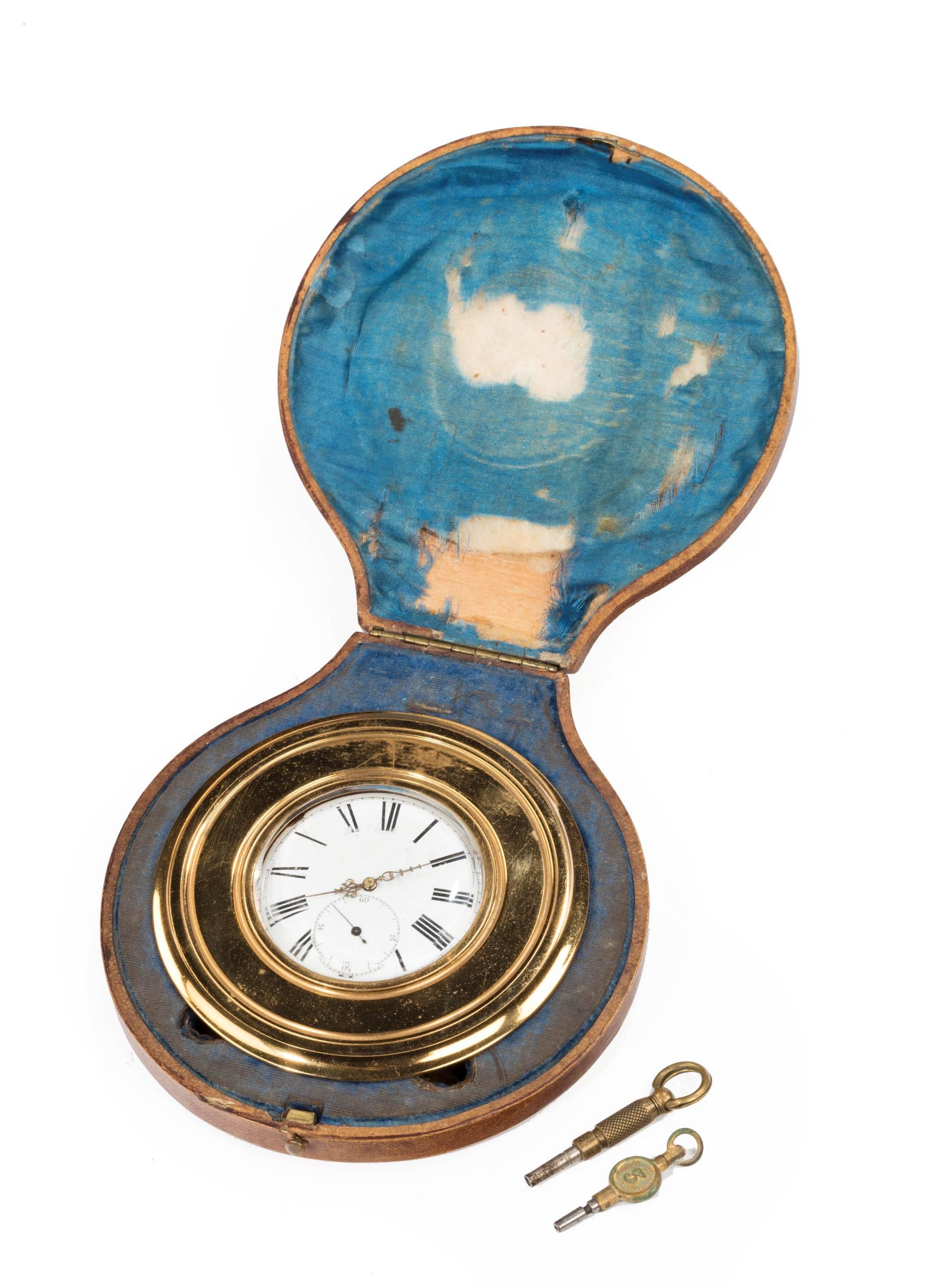 19th century brass table watch or Strut clock in the original, rather fine, leather case with a ducal coronet.