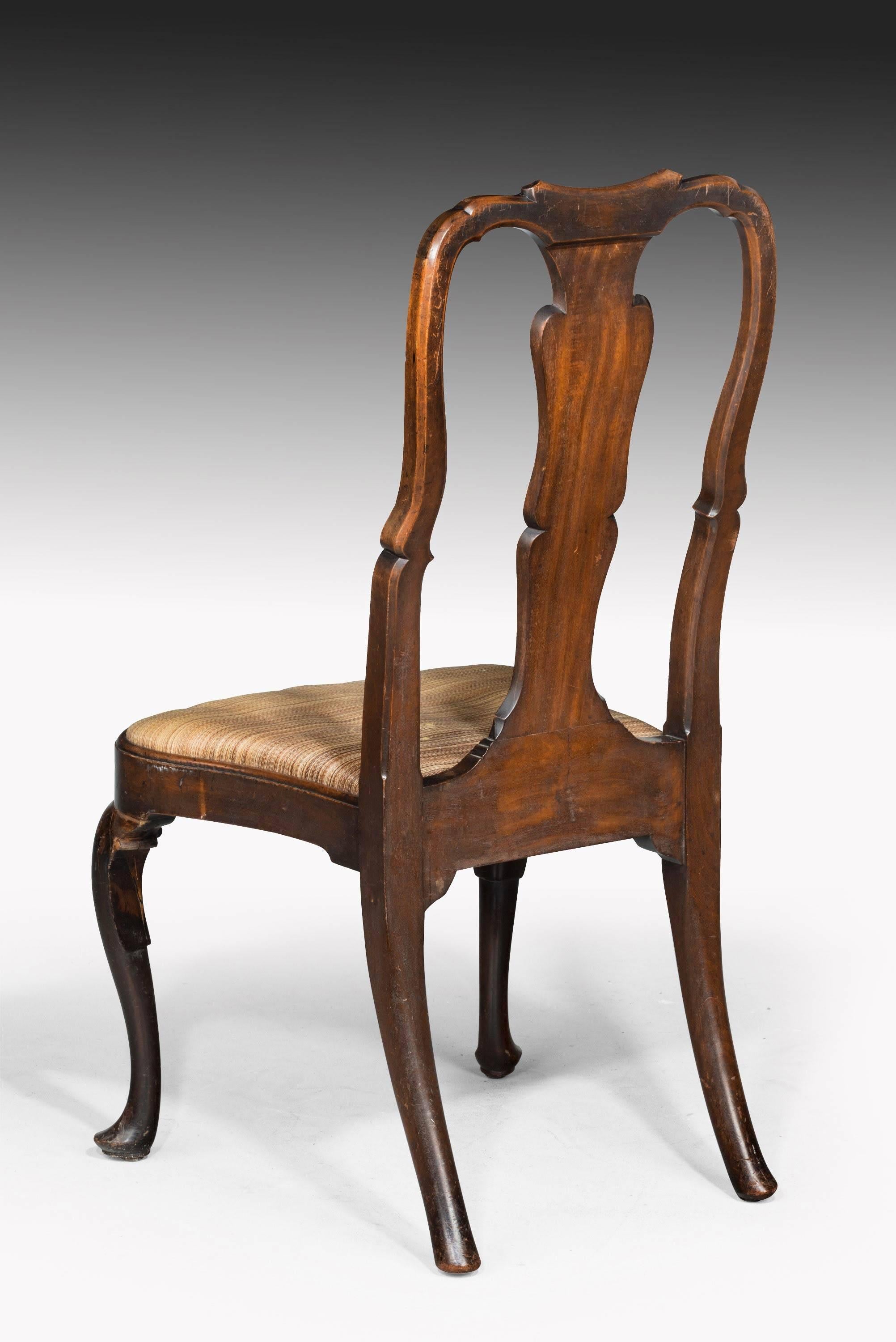 A very unusual George II period mahogany single chair of Queen Anne design. Shaped vase splat and shaped side rails. Excellent overall condition. 

Seat height 18 inches.