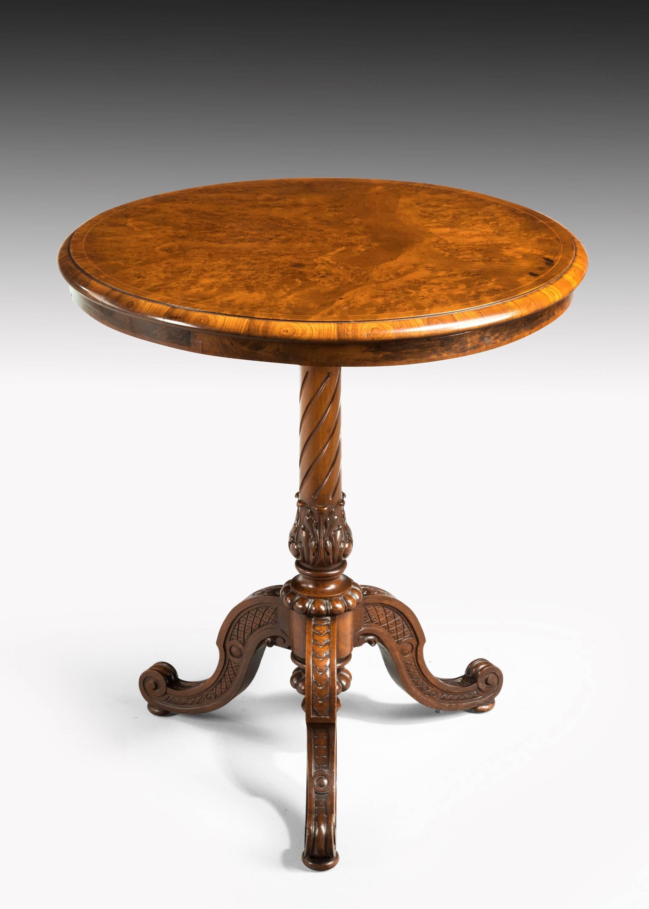 A most unusual, small, burr walnut occasional table. On finely carved cabriole supports ending in scroll toes. The central section writhen over anthemion decoration. Lovely old color and patina.
