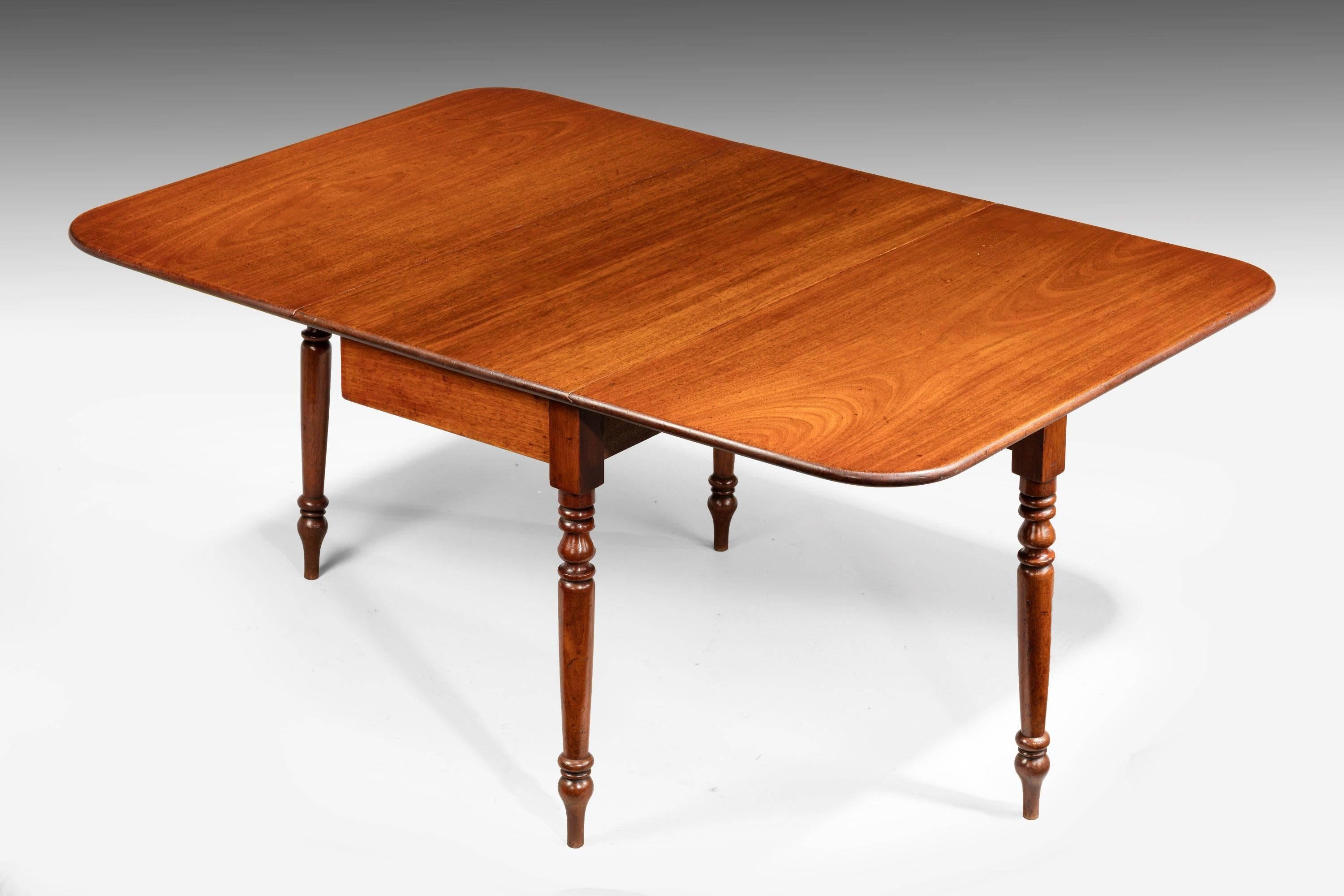 A very finely figured Regency period drop-leaf dining table on well-turned shaped supports.

Measures: Open width - 61.00 inches.
RR.
       
                        
                  