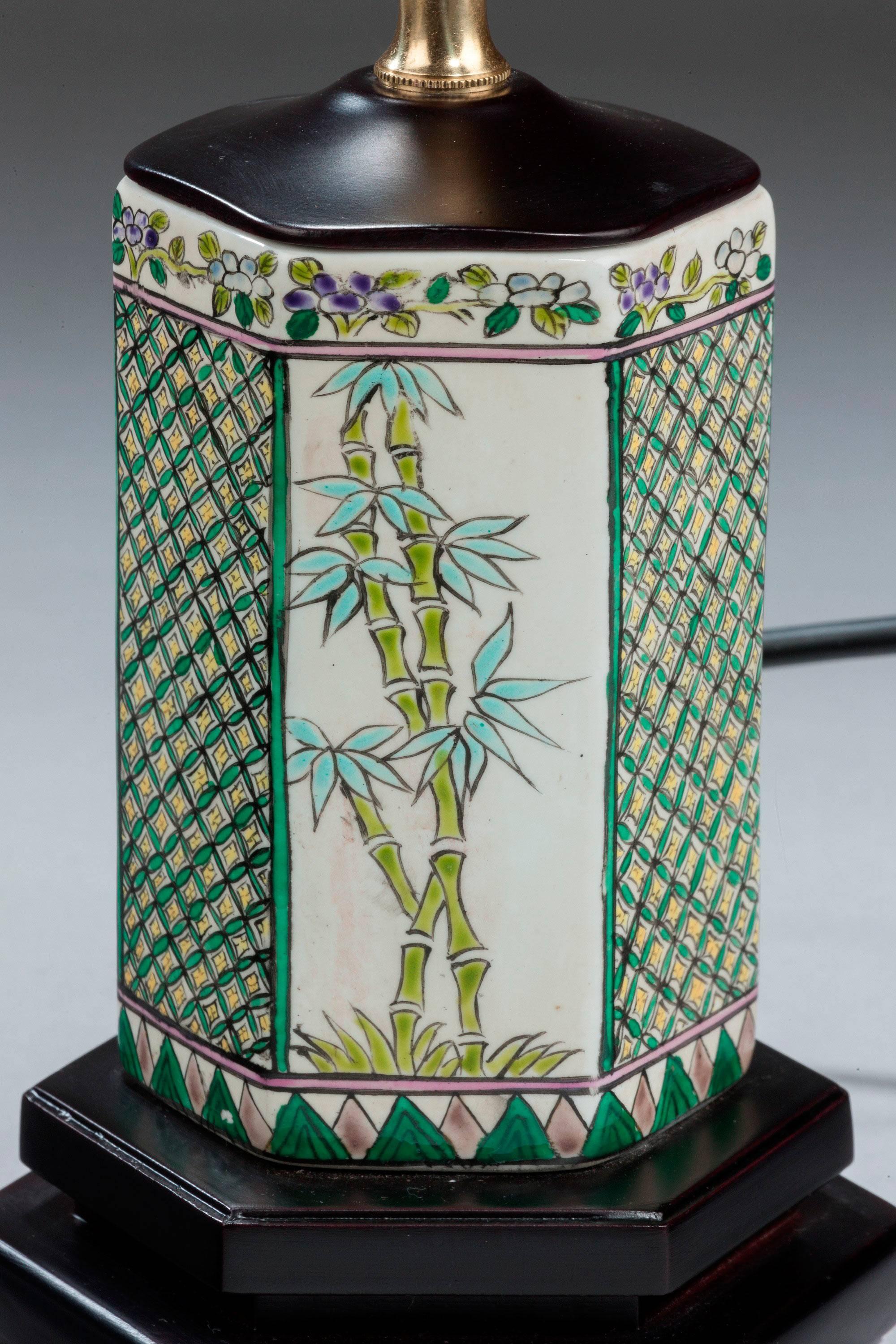 Pair of small Canton design porcelain hexagonal lamps with bamboo and trellis decoration. Modern.

Canton porcelains are Chinese ceramic wares made for export in the 18th-20th century. The wares were made, glazed and fired at Jingdezhen but