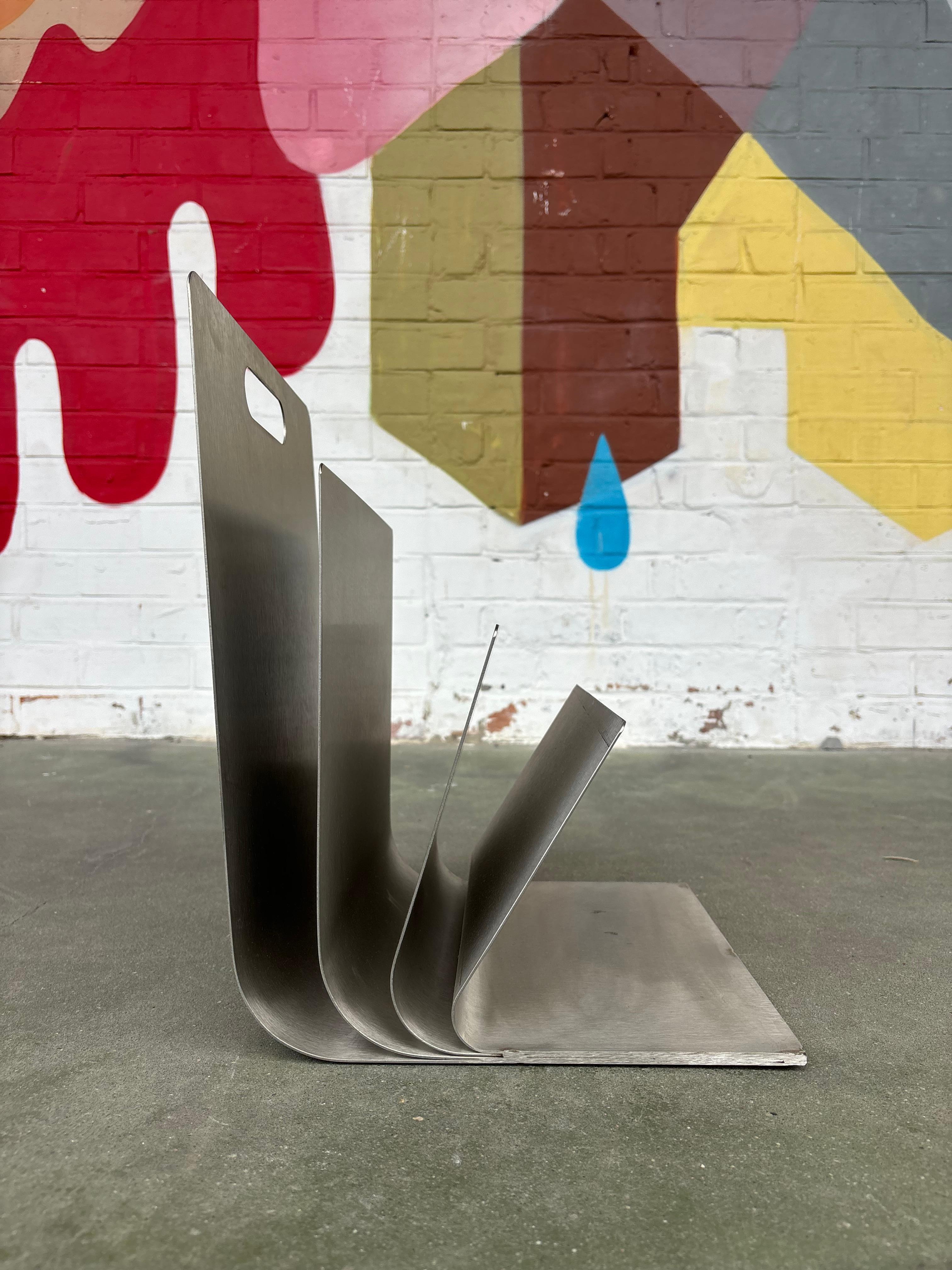 Magazine rack by Xavier Féal For Sale 1