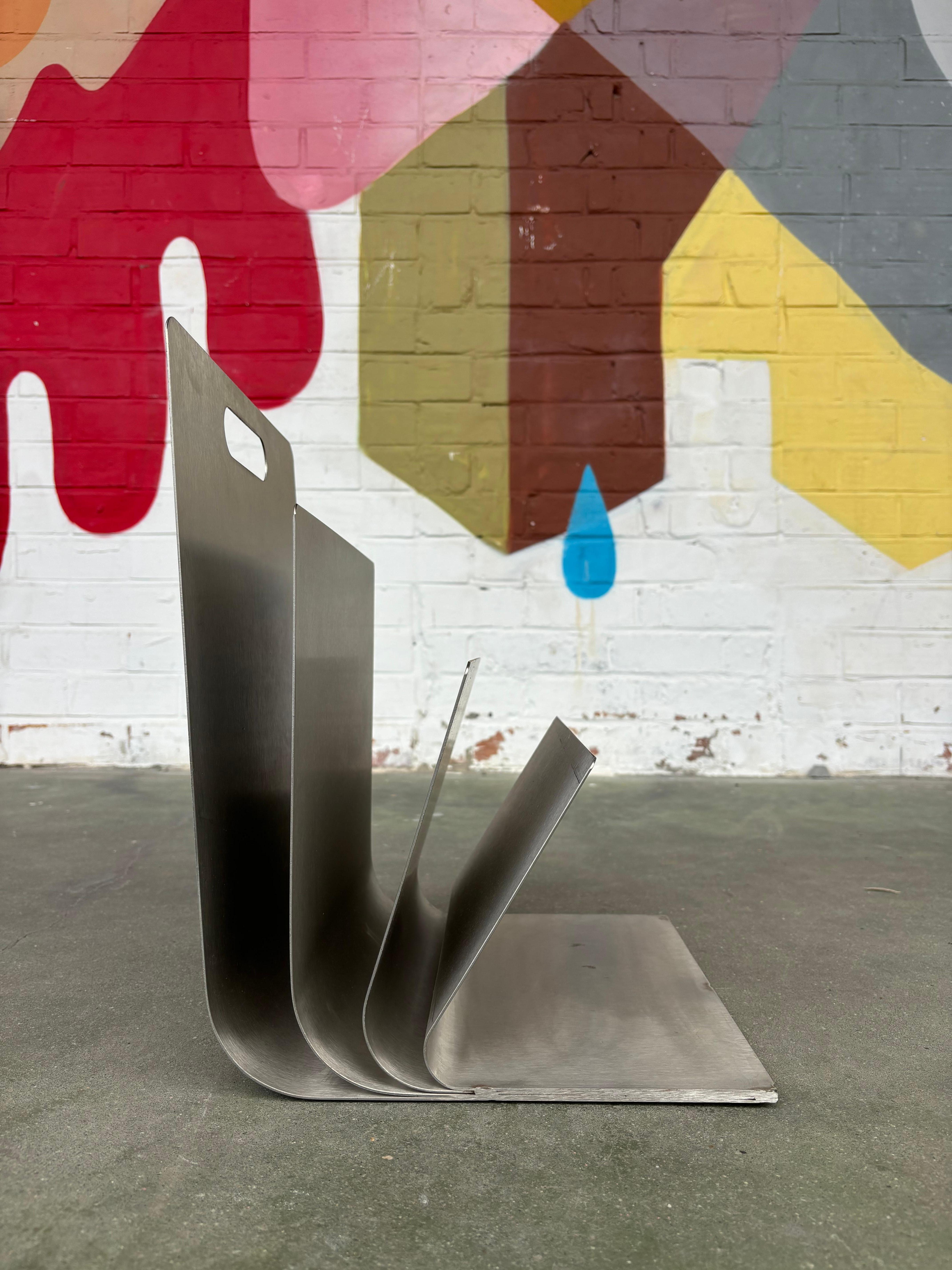 Stainless Steel Magazine rack by Xavier Féal For Sale