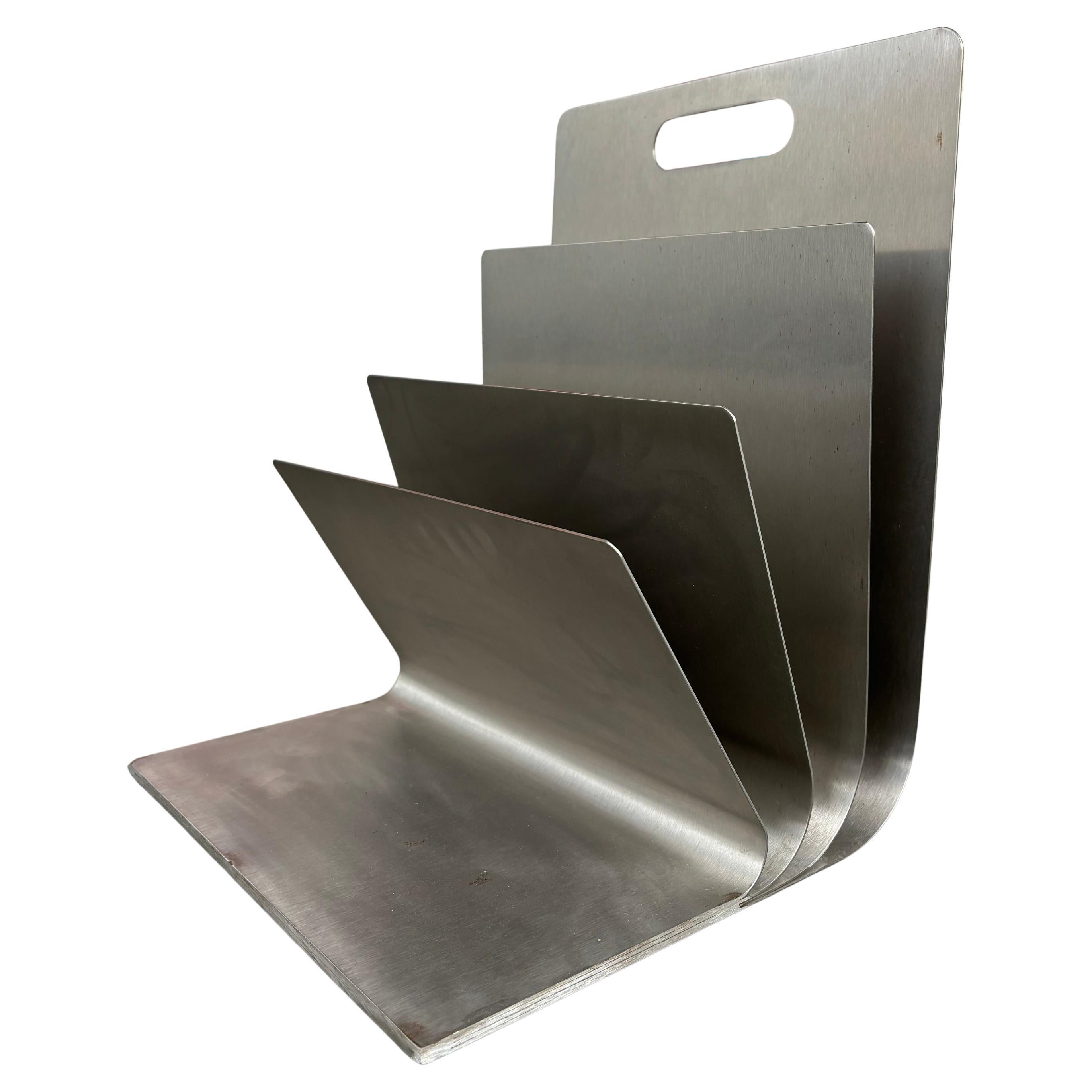 Magazine rack by Xavier Féal For Sale