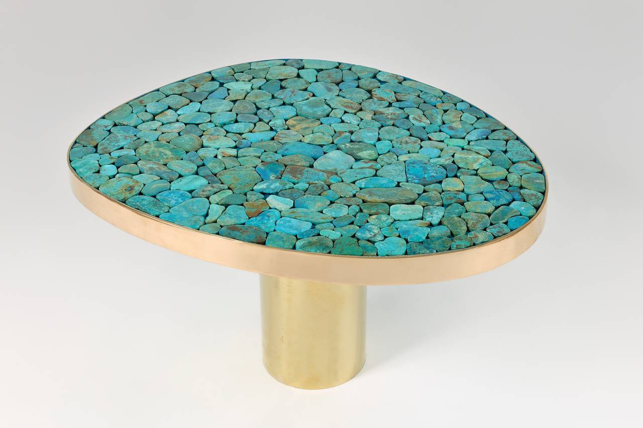 Very refined coffee table by Kam Tin.
The base is in brass and the top is composed of a turquoise mosaic.
The edge is in bronze.
Stamped and numbered
Limited edition.