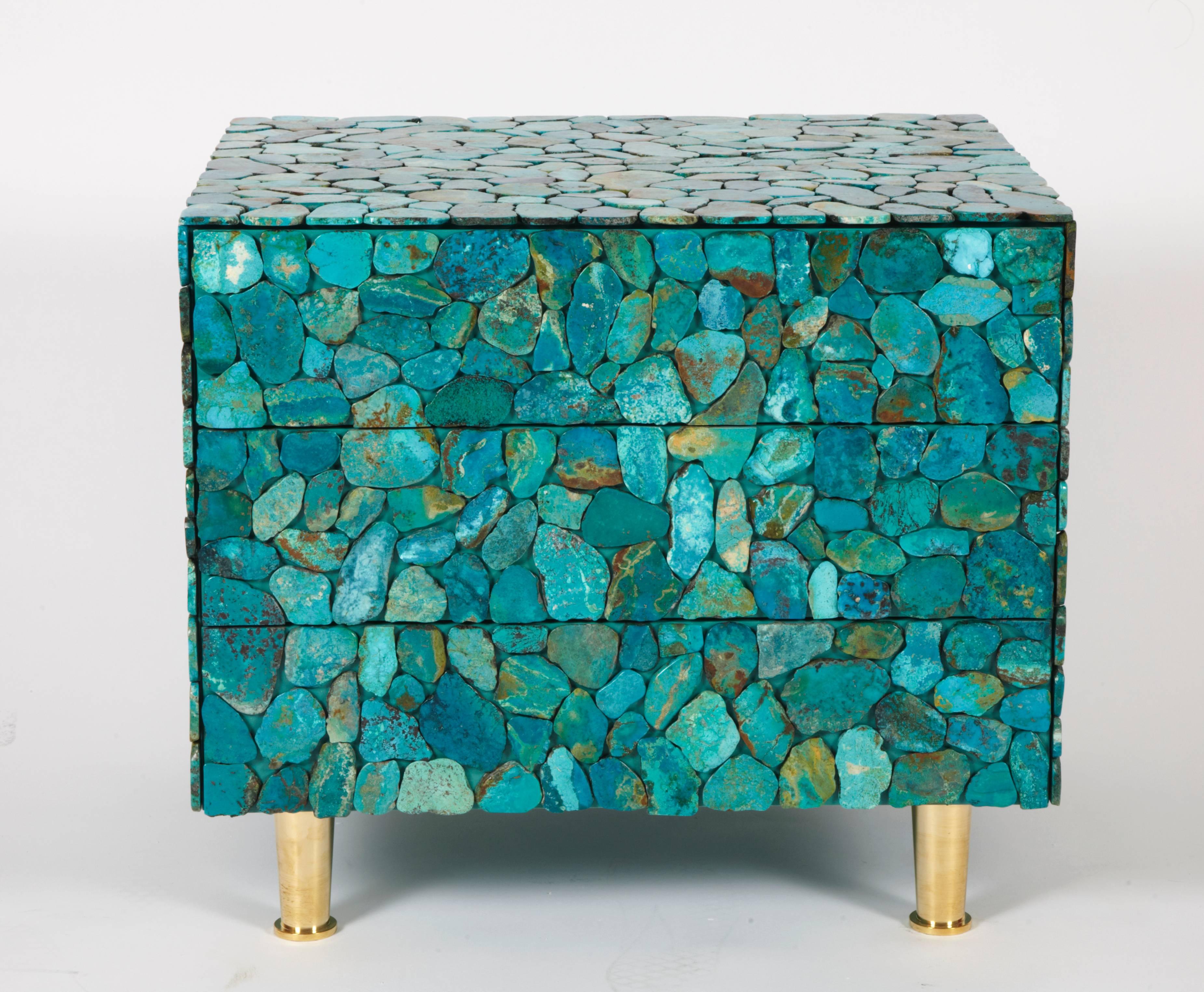 Pair of bedsides, 2014.
Beech wood, turquoise, brass.
Measures: H: 47 cm; W: 54 cm; D: 45 cm.
Stamped Kam Tin.
Limited edition.

Pair of bedsides in beechwood, lacquered and covered with turquoise. There are three drawers.
 