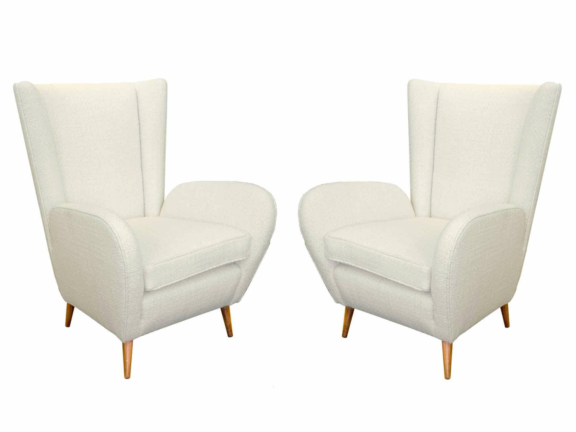 Paolo Buffa (1903-1970).

Pair of armchairs.

Bouclé fabric, wooden feet,

Italy, 1950. 

Measures: H 95 cm; W 70 cm; D 74 cm.