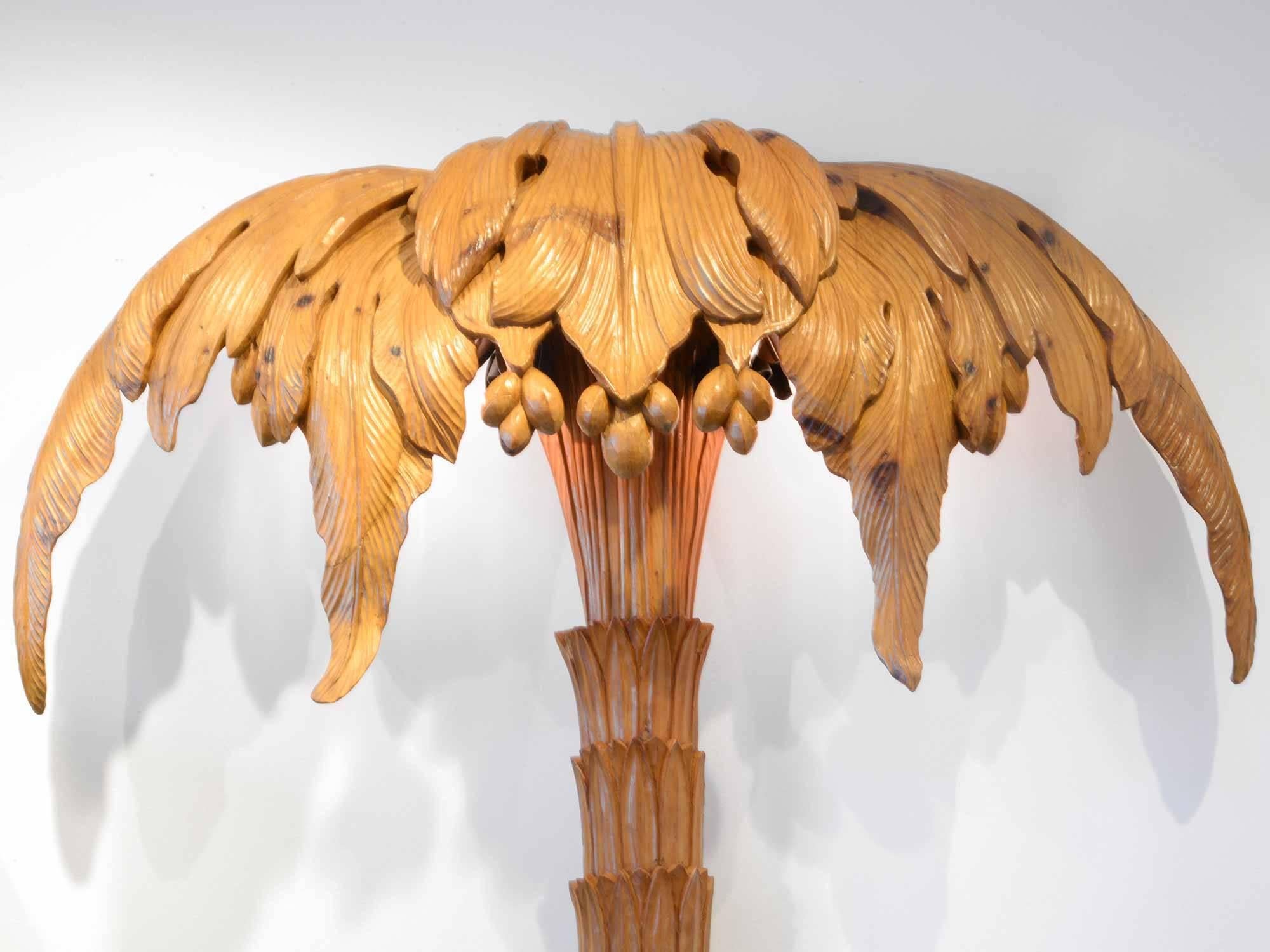 Maison Jansen.
Pair of palm trees floor lamps.

Sculpted wood.

Measures: H:215 cm;  W: 140 cm; D: 25 cm,

France, circa 1940.