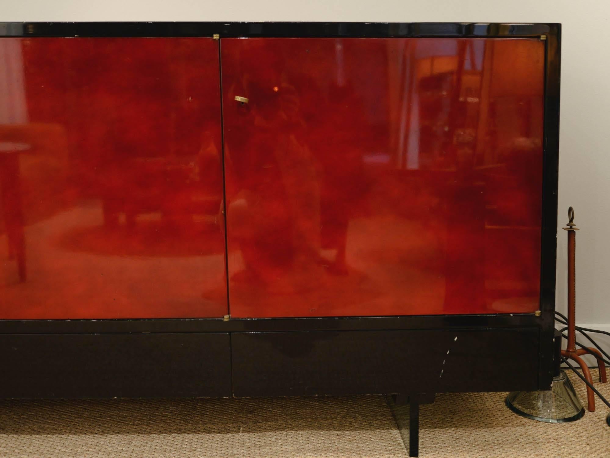 Raphaël
Sideboard
Beka lacquer wood glass
France, 1950.
Measures: H 84 x W 220 x D 46 cm
H 33 1/8 x W 86 5/8 x D 18 1/8 inch.
Referenced in 